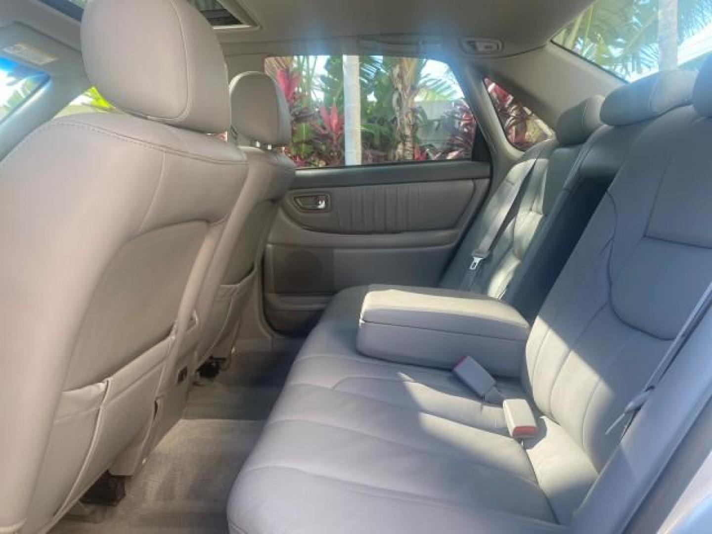 2003 Silver Spruce Metallic /Stone Toyota Avalon XLS 1 FL LOW MILES 32,452 (4T1BF28B03U) with an 3.0L DOHC MPFI 24-Valve V6 Engine engine, Automatic transmission, located at 4701 North Dixie Hwy, Pompano Beach, FL, 33064, (954) 422-2889, 26.240938, -80.123474 - OUR WEBPAGE FLORIDACARS1.COM HAS OVER 100 PHOTOS AND FREE CARFAX LINK 2003 TOYOTA AVALON XLS BUCKET LEATHER SEATS ! VIN: 4T1BF28B03U273831 4 T 1 B F 2 8 B 0 3 U 2 7 3 8 3 1 SEDAN 4 DR 3.0L V6 F DOHC 24V GASOLINE 29 MPG FRONT WHEEL DRIVE TIRES LOOK LIKE NEW ! Top Features Alloy Wheels Luxury Package - Photo#59
