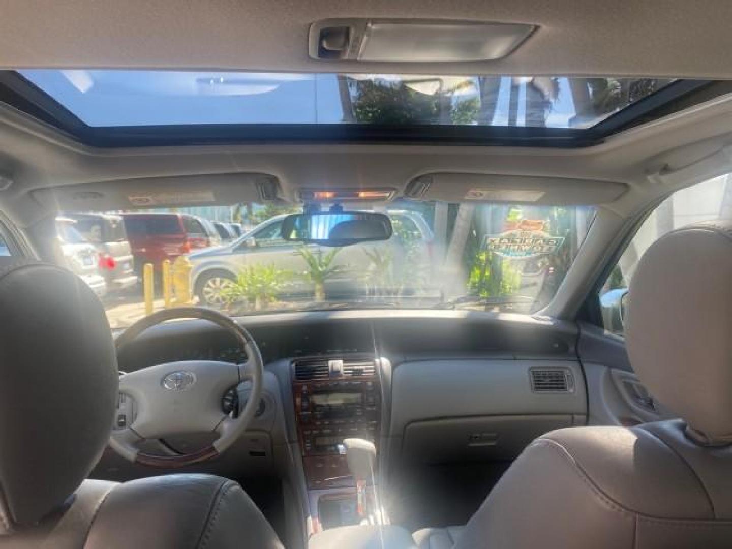 2003 Silver Spruce Metallic /Stone Toyota Avalon XLS 1 FL LOW MILES 32,452 (4T1BF28B03U) with an 3.0L DOHC MPFI 24-Valve V6 Engine engine, Automatic transmission, located at 4701 North Dixie Hwy, Pompano Beach, FL, 33064, (954) 422-2889, 26.240938, -80.123474 - OUR WEBPAGE FLORIDACARS1.COM HAS OVER 100 PHOTOS AND FREE CARFAX LINK 2003 TOYOTA AVALON XLS BUCKET LEATHER SEATS ! VIN: 4T1BF28B03U273831 4 T 1 B F 2 8 B 0 3 U 2 7 3 8 3 1 SEDAN 4 DR 3.0L V6 F DOHC 24V GASOLINE 29 MPG FRONT WHEEL DRIVE TIRES LOOK LIKE NEW ! Top Features Alloy Wheels Luxury Package - Photo#63