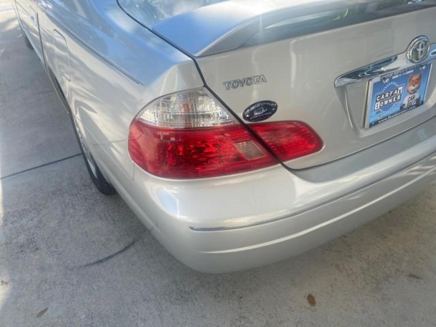 2003 Silver Spruce Metallic /Stone Toyota Avalon XLS 1 FL LOW MILES 32,452 (4T1BF28B03U) with an 3.0L DOHC MPFI 24-Valve V6 Engine engine, Automatic transmission, located at 4701 North Dixie Hwy, Pompano Beach, FL, 33064, (954) 422-2889, 26.240938, -80.123474 - OUR WEBPAGE FLORIDACARS1.COM HAS OVER 100 PHOTOS AND FREE CARFAX LINK 2003 TOYOTA AVALON XLS BUCKET LEATHER SEATS ! VIN: 4T1BF28B03U273831 4 T 1 B F 2 8 B 0 3 U 2 7 3 8 3 1 SEDAN 4 DR 3.0L V6 F DOHC 24V GASOLINE 29 MPG FRONT WHEEL DRIVE TIRES LOOK LIKE NEW ! Top Features Alloy Wheels Luxury Package - Photo#71