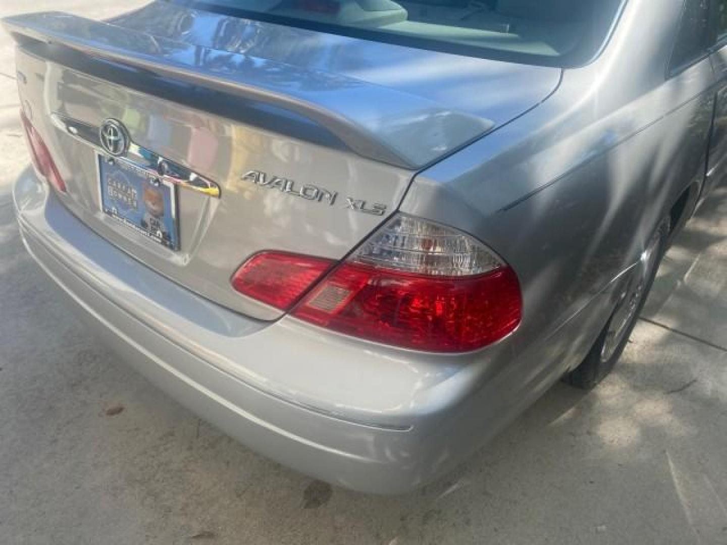 2003 Silver Spruce Metallic /Stone Toyota Avalon XLS 1 FL LOW MILES 32,452 (4T1BF28B03U) with an 3.0L DOHC MPFI 24-Valve V6 Engine engine, Automatic transmission, located at 4701 North Dixie Hwy, Pompano Beach, FL, 33064, (954) 422-2889, 26.240938, -80.123474 - OUR WEBPAGE FLORIDACARS1.COM HAS OVER 100 PHOTOS AND FREE CARFAX LINK 2003 TOYOTA AVALON XLS BUCKET LEATHER SEATS ! VIN: 4T1BF28B03U273831 4 T 1 B F 2 8 B 0 3 U 2 7 3 8 3 1 SEDAN 4 DR 3.0L V6 F DOHC 24V GASOLINE 29 MPG FRONT WHEEL DRIVE TIRES LOOK LIKE NEW ! Top Features Alloy Wheels Luxury Package - Photo#75