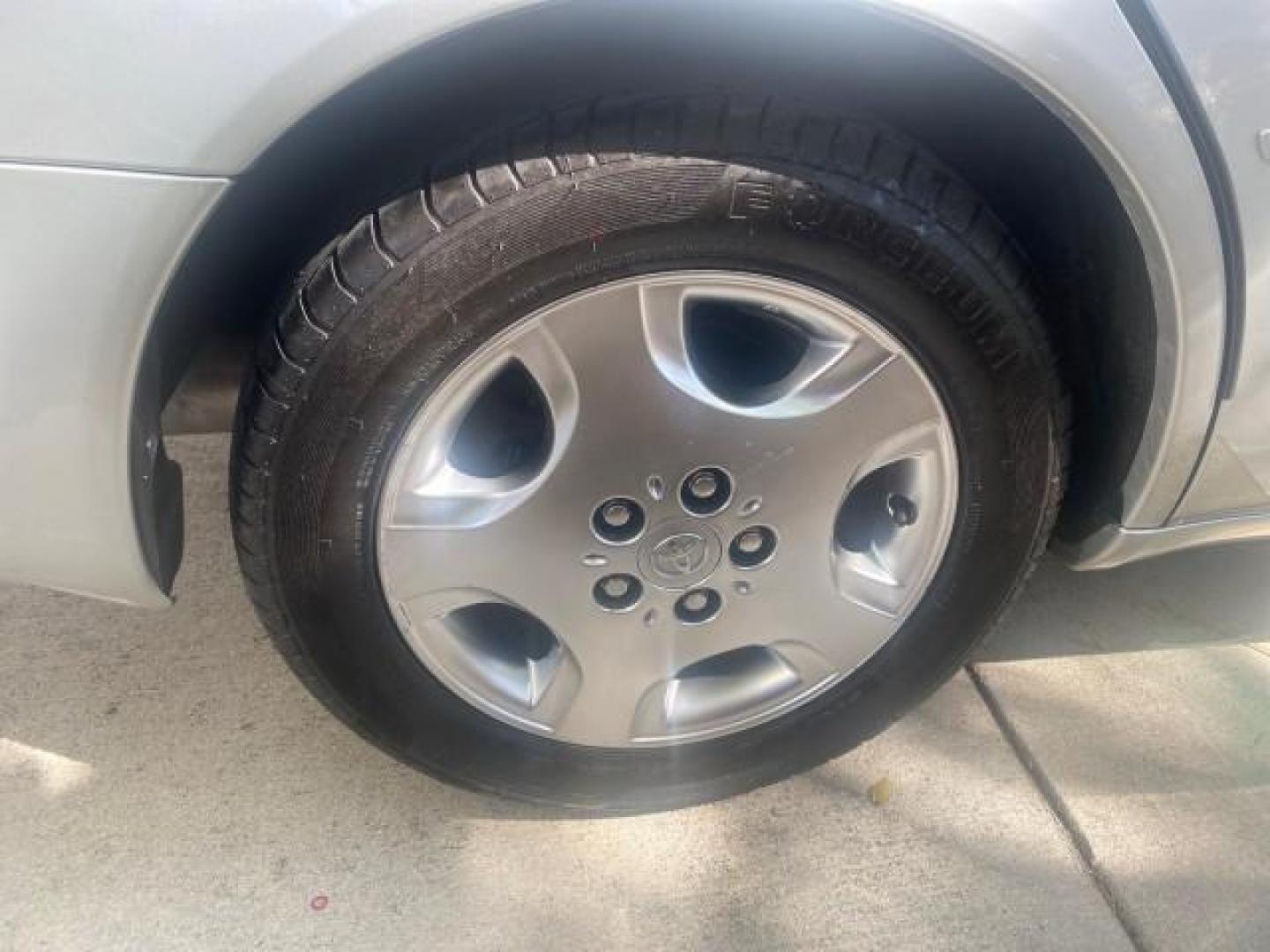 2003 Silver Spruce Metallic /Stone Toyota Avalon XLS 1 FL LOW MILES 32,452 (4T1BF28B03U) with an 3.0L DOHC MPFI 24-Valve V6 Engine engine, Automatic transmission, located at 4701 North Dixie Hwy, Pompano Beach, FL, 33064, (954) 422-2889, 26.240938, -80.123474 - OUR WEBPAGE FLORIDACARS1.COM HAS OVER 100 PHOTOS AND FREE CARFAX LINK 2003 TOYOTA AVALON XLS BUCKET LEATHER SEATS ! VIN: 4T1BF28B03U273831 4 T 1 B F 2 8 B 0 3 U 2 7 3 8 3 1 SEDAN 4 DR 3.0L V6 F DOHC 24V GASOLINE 29 MPG FRONT WHEEL DRIVE TIRES LOOK LIKE NEW ! Top Features Alloy Wheels Luxury Package - Photo#76