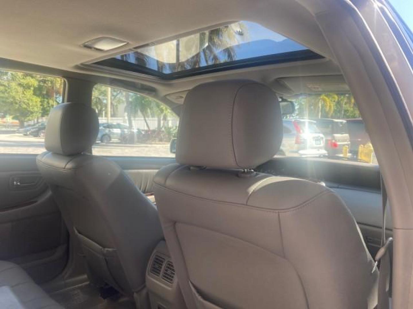 2003 Silver Spruce Metallic /Stone Toyota Avalon XLS 1 FL LOW MILES 32,452 (4T1BF28B03U) with an 3.0L DOHC MPFI 24-Valve V6 Engine engine, Automatic transmission, located at 4701 North Dixie Hwy, Pompano Beach, FL, 33064, (954) 422-2889, 26.240938, -80.123474 - OUR WEBPAGE FLORIDACARS1.COM HAS OVER 100 PHOTOS AND FREE CARFAX LINK 2003 TOYOTA AVALON XLS BUCKET LEATHER SEATS ! VIN: 4T1BF28B03U273831 4 T 1 B F 2 8 B 0 3 U 2 7 3 8 3 1 SEDAN 4 DR 3.0L V6 F DOHC 24V GASOLINE 29 MPG FRONT WHEEL DRIVE TIRES LOOK LIKE NEW ! Top Features Alloy Wheels Luxury Package - Photo#84