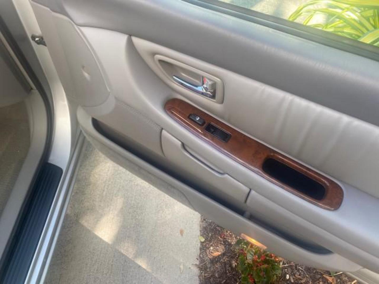 2003 Silver Spruce Metallic /Stone Toyota Avalon XLS 1 FL LOW MILES 32,452 (4T1BF28B03U) with an 3.0L DOHC MPFI 24-Valve V6 Engine engine, Automatic transmission, located at 4701 North Dixie Hwy, Pompano Beach, FL, 33064, (954) 422-2889, 26.240938, -80.123474 - OUR WEBPAGE FLORIDACARS1.COM HAS OVER 100 PHOTOS AND FREE CARFAX LINK 2003 TOYOTA AVALON XLS BUCKET LEATHER SEATS ! VIN: 4T1BF28B03U273831 4 T 1 B F 2 8 B 0 3 U 2 7 3 8 3 1 SEDAN 4 DR 3.0L V6 F DOHC 24V GASOLINE 29 MPG FRONT WHEEL DRIVE TIRES LOOK LIKE NEW ! Top Features Alloy Wheels Luxury Package - Photo#89