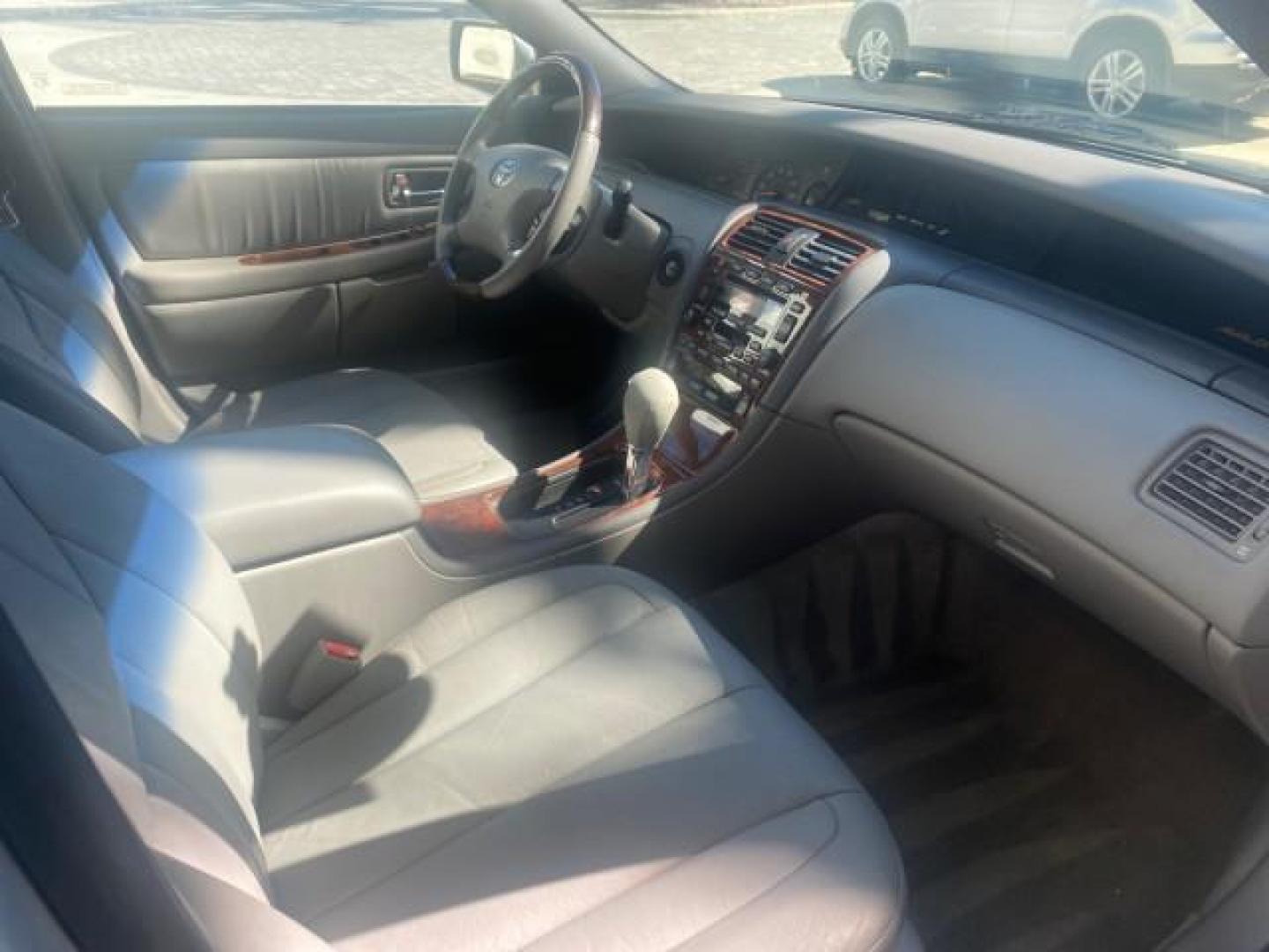 2003 Silver Spruce Metallic /Stone Toyota Avalon XLS 1 FL LOW MILES 32,452 (4T1BF28B03U) with an 3.0L DOHC MPFI 24-Valve V6 Engine engine, Automatic transmission, located at 4701 North Dixie Hwy, Pompano Beach, FL, 33064, (954) 422-2889, 26.240938, -80.123474 - OUR WEBPAGE FLORIDACARS1.COM HAS OVER 100 PHOTOS AND FREE CARFAX LINK 2003 TOYOTA AVALON XLS BUCKET LEATHER SEATS ! VIN: 4T1BF28B03U273831 4 T 1 B F 2 8 B 0 3 U 2 7 3 8 3 1 SEDAN 4 DR 3.0L V6 F DOHC 24V GASOLINE 29 MPG FRONT WHEEL DRIVE TIRES LOOK LIKE NEW ! Top Features Alloy Wheels Luxury Package - Photo#90