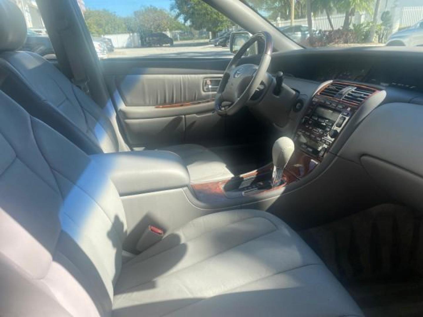 2003 Silver Spruce Metallic /Stone Toyota Avalon XLS 1 FL LOW MILES 32,452 (4T1BF28B03U) with an 3.0L DOHC MPFI 24-Valve V6 Engine engine, Automatic transmission, located at 4701 North Dixie Hwy, Pompano Beach, FL, 33064, (954) 422-2889, 26.240938, -80.123474 - OUR WEBPAGE FLORIDACARS1.COM HAS OVER 100 PHOTOS AND FREE CARFAX LINK 2003 TOYOTA AVALON XLS BUCKET LEATHER SEATS ! VIN: 4T1BF28B03U273831 4 T 1 B F 2 8 B 0 3 U 2 7 3 8 3 1 SEDAN 4 DR 3.0L V6 F DOHC 24V GASOLINE 29 MPG FRONT WHEEL DRIVE TIRES LOOK LIKE NEW ! Top Features Alloy Wheels Luxury Package - Photo#91
