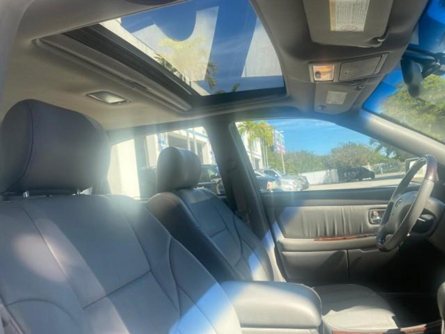 2003 Silver Spruce Metallic /Stone Toyota Avalon XLS 1 FL LOW MILES 32,452 (4T1BF28B03U) with an 3.0L DOHC MPFI 24-Valve V6 Engine engine, Automatic transmission, located at 4701 North Dixie Hwy, Pompano Beach, FL, 33064, (954) 422-2889, 26.240938, -80.123474 - OUR WEBPAGE FLORIDACARS1.COM HAS OVER 100 PHOTOS AND FREE CARFAX LINK 2003 TOYOTA AVALON XLS BUCKET LEATHER SEATS ! VIN: 4T1BF28B03U273831 4 T 1 B F 2 8 B 0 3 U 2 7 3 8 3 1 SEDAN 4 DR 3.0L V6 F DOHC 24V GASOLINE 29 MPG FRONT WHEEL DRIVE TIRES LOOK LIKE NEW ! Top Features Alloy Wheels Luxury Package - Photo#92