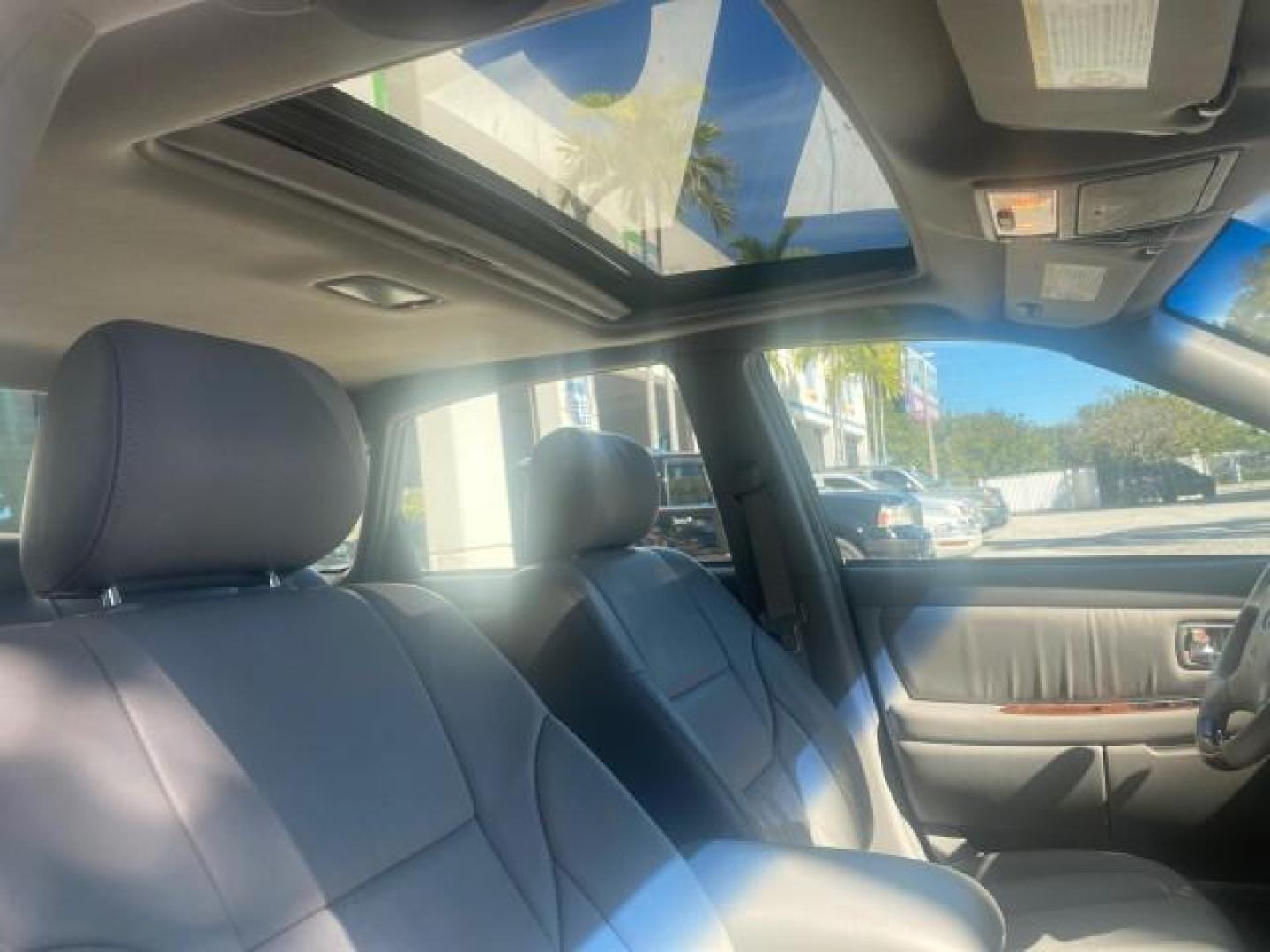 2003 Silver Spruce Metallic /Stone Toyota Avalon XLS 1 FL LOW MILES 32,452 (4T1BF28B03U) with an 3.0L DOHC MPFI 24-Valve V6 Engine engine, Automatic transmission, located at 4701 North Dixie Hwy, Pompano Beach, FL, 33064, (954) 422-2889, 26.240938, -80.123474 - OUR WEBPAGE FLORIDACARS1.COM HAS OVER 100 PHOTOS AND FREE CARFAX LINK 2003 TOYOTA AVALON XLS BUCKET LEATHER SEATS ! VIN: 4T1BF28B03U273831 4 T 1 B F 2 8 B 0 3 U 2 7 3 8 3 1 SEDAN 4 DR 3.0L V6 F DOHC 24V GASOLINE 29 MPG FRONT WHEEL DRIVE TIRES LOOK LIKE NEW ! Top Features Alloy Wheels Luxury Package - Photo#93