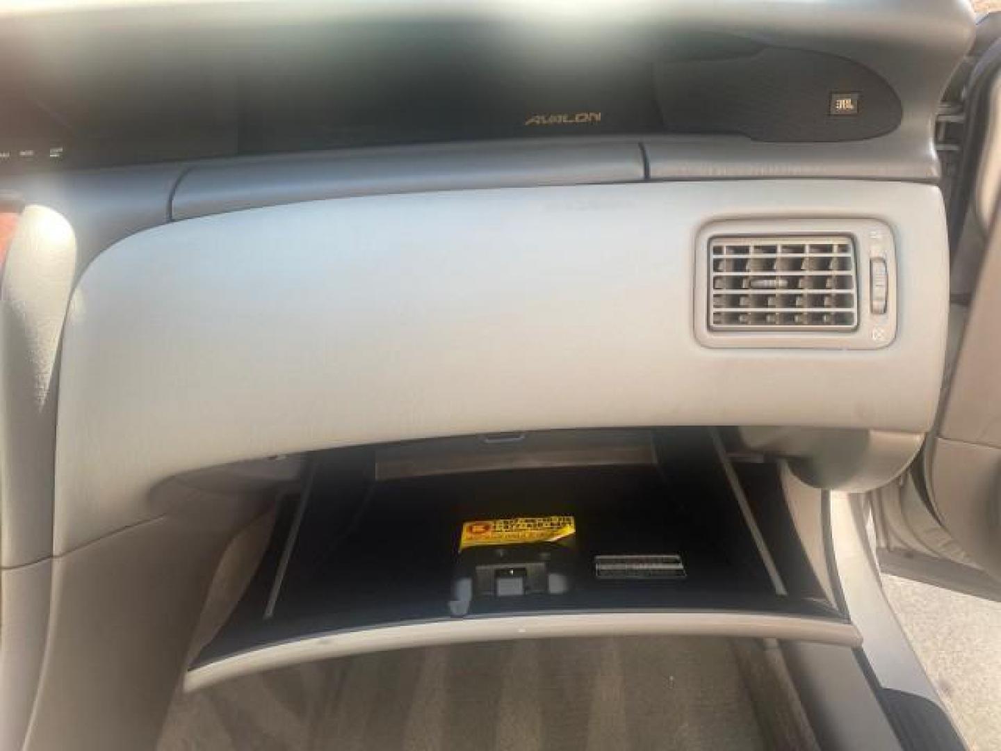 2003 Silver Spruce Metallic /Stone Toyota Avalon XLS 1 FL LOW MILES 32,452 (4T1BF28B03U) with an 3.0L DOHC MPFI 24-Valve V6 Engine engine, Automatic transmission, located at 4701 North Dixie Hwy, Pompano Beach, FL, 33064, (954) 422-2889, 26.240938, -80.123474 - OUR WEBPAGE FLORIDACARS1.COM HAS OVER 100 PHOTOS AND FREE CARFAX LINK 2003 TOYOTA AVALON XLS BUCKET LEATHER SEATS ! VIN: 4T1BF28B03U273831 4 T 1 B F 2 8 B 0 3 U 2 7 3 8 3 1 SEDAN 4 DR 3.0L V6 F DOHC 24V GASOLINE 29 MPG FRONT WHEEL DRIVE TIRES LOOK LIKE NEW ! Top Features Alloy Wheels Luxury Package - Photo#95