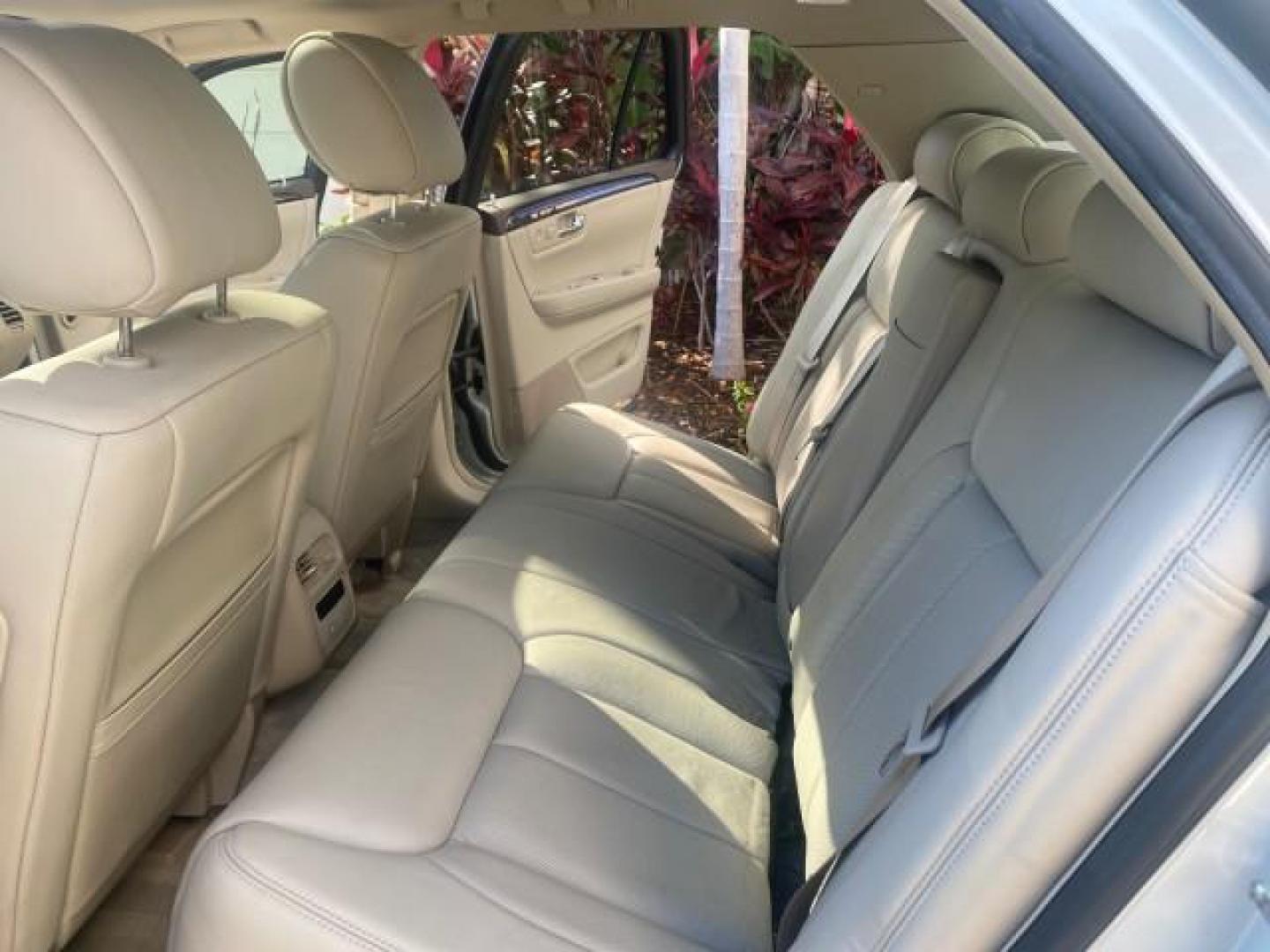2010 Ocean Pearl Tricoat /Shale/Cocoa Cadillac DTS LOW MILES 39,495 NAV SUNROOF (1G6KH5EY7AU) with an Northstar 4.6L DOHC V8 Engine engine, Automatic transmission, located at 4701 North Dixie Hwy, Pompano Beach, FL, 33064, (954) 422-2889, 26.240938, -80.123474 - OUR WEBPAGE FLORIDACARS1.COM HAS OVER 100 PHOTOS AND FREE CARFAX LINK 2010 CADILLAC DTS PREMIUM COLLECTION $ 56,425 NEW VIN: 1G6KH5EY7AU102292 1 G 6 K H 5 E Y 7 A U 1 0 2 2 9 2 SEDAN 4 DR 4.6L V8 F DOHC 32V GASOLINE FRONT WHEEL DRIVE Top Features A/C Seat(s) Navigation System Alloy Wheels Parking Se - Photo#14