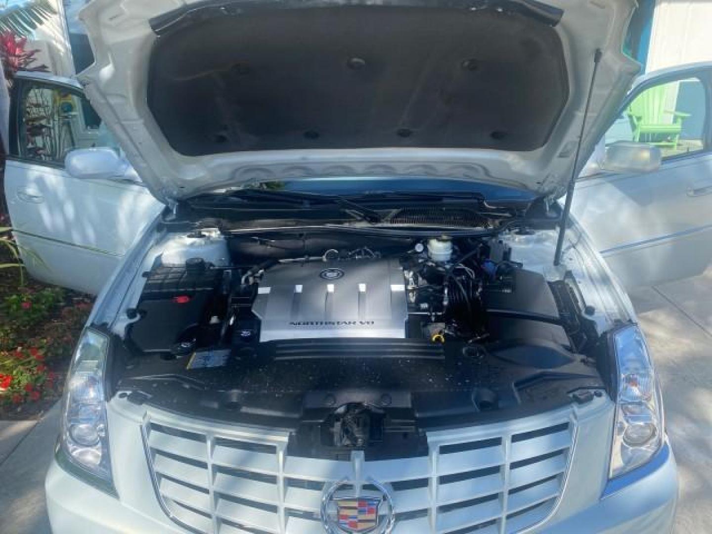 2010 Ocean Pearl Tricoat /Shale/Cocoa Cadillac DTS LOW MILES 39,495 NAV SUNROOF (1G6KH5EY7AU) with an Northstar 4.6L DOHC V8 Engine engine, Automatic transmission, located at 4701 North Dixie Hwy, Pompano Beach, FL, 33064, (954) 422-2889, 26.240938, -80.123474 - OUR WEBPAGE FLORIDACARS1.COM HAS OVER 100 PHOTOS AND FREE CARFAX LINK 2010 CADILLAC DTS PREMIUM COLLECTION $ 56,425 NEW VIN: 1G6KH5EY7AU102292 1 G 6 K H 5 E Y 7 A U 1 0 2 2 9 2 SEDAN 4 DR 4.6L V8 F DOHC 32V GASOLINE FRONT WHEEL DRIVE Top Features A/C Seat(s) Navigation System Alloy Wheels Parking Se - Photo#17