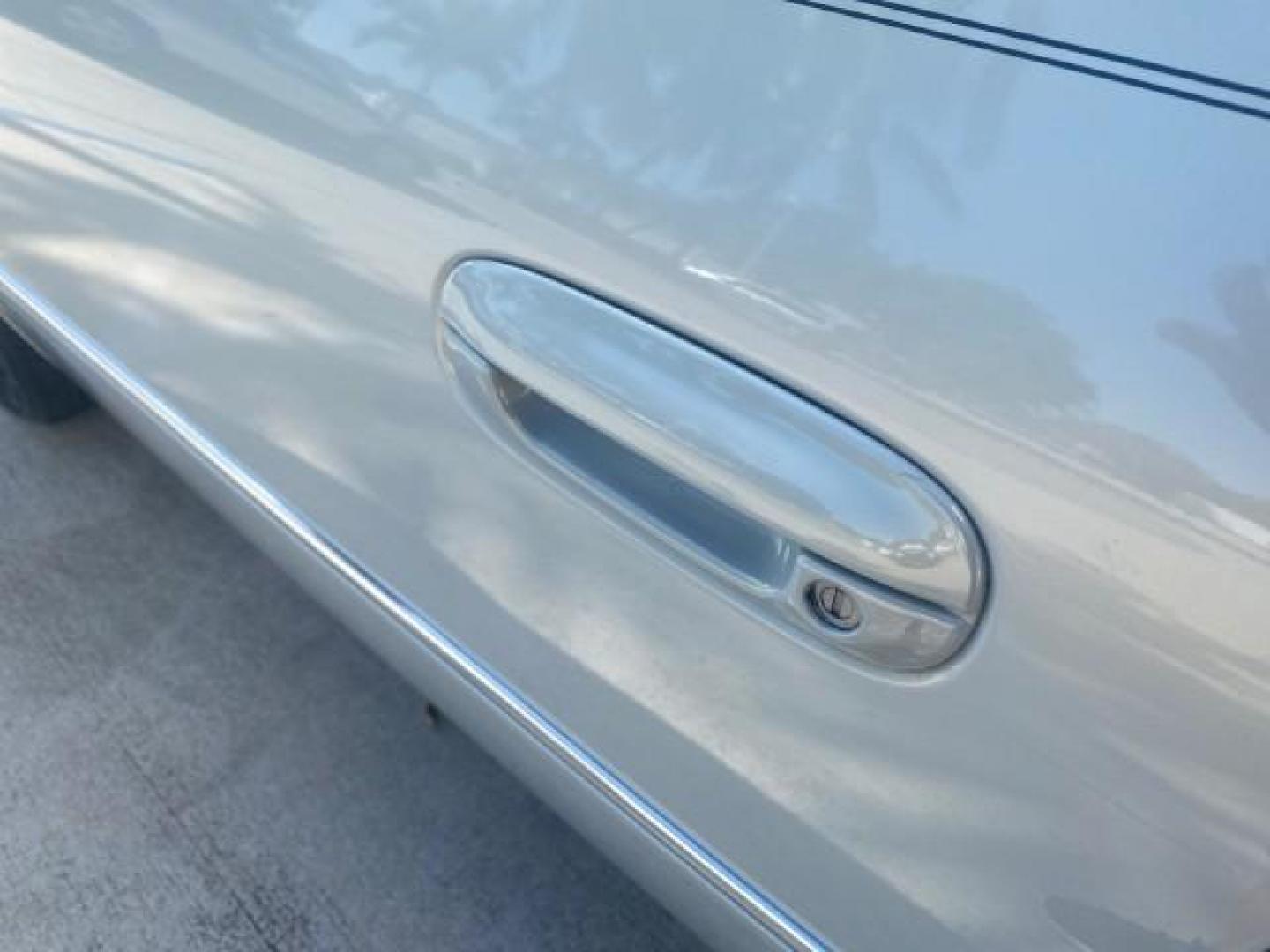 2010 Ocean Pearl Tricoat /Shale/Cocoa Cadillac DTS LOW MILES 39,495 NAV SUNROOF (1G6KH5EY7AU) with an Northstar 4.6L DOHC V8 Engine engine, Automatic transmission, located at 4701 North Dixie Hwy, Pompano Beach, FL, 33064, (954) 422-2889, 26.240938, -80.123474 - OUR WEBPAGE FLORIDACARS1.COM HAS OVER 100 PHOTOS AND FREE CARFAX LINK 2010 CADILLAC DTS PREMIUM COLLECTION $ 56,425 NEW VIN: 1G6KH5EY7AU102292 1 G 6 K H 5 E Y 7 A U 1 0 2 2 9 2 SEDAN 4 DR 4.6L V8 F DOHC 32V GASOLINE FRONT WHEEL DRIVE Top Features A/C Seat(s) Navigation System Alloy Wheels Parking Se - Photo#27