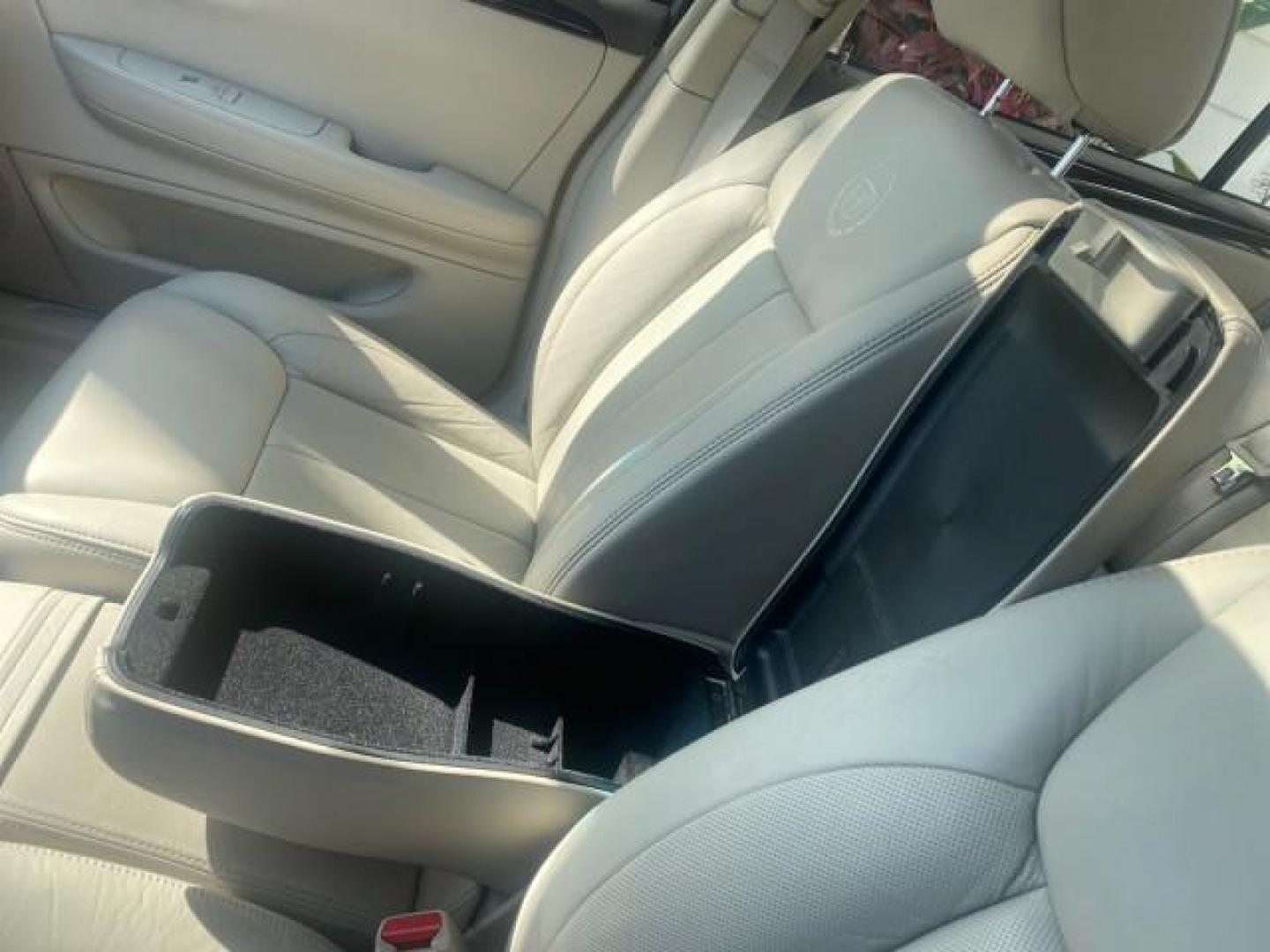 2010 Ocean Pearl Tricoat /Shale/Cocoa Cadillac DTS LOW MILES 39,495 NAV SUNROOF (1G6KH5EY7AU) with an Northstar 4.6L DOHC V8 Engine engine, Automatic transmission, located at 4701 North Dixie Hwy, Pompano Beach, FL, 33064, (954) 422-2889, 26.240938, -80.123474 - OUR WEBPAGE FLORIDACARS1.COM HAS OVER 100 PHOTOS AND FREE CARFAX LINK 2010 CADILLAC DTS PREMIUM COLLECTION $ 56,425 NEW VIN: 1G6KH5EY7AU102292 1 G 6 K H 5 E Y 7 A U 1 0 2 2 9 2 SEDAN 4 DR 4.6L V8 F DOHC 32V GASOLINE FRONT WHEEL DRIVE Top Features A/C Seat(s) Navigation System Alloy Wheels Parking Se - Photo#56