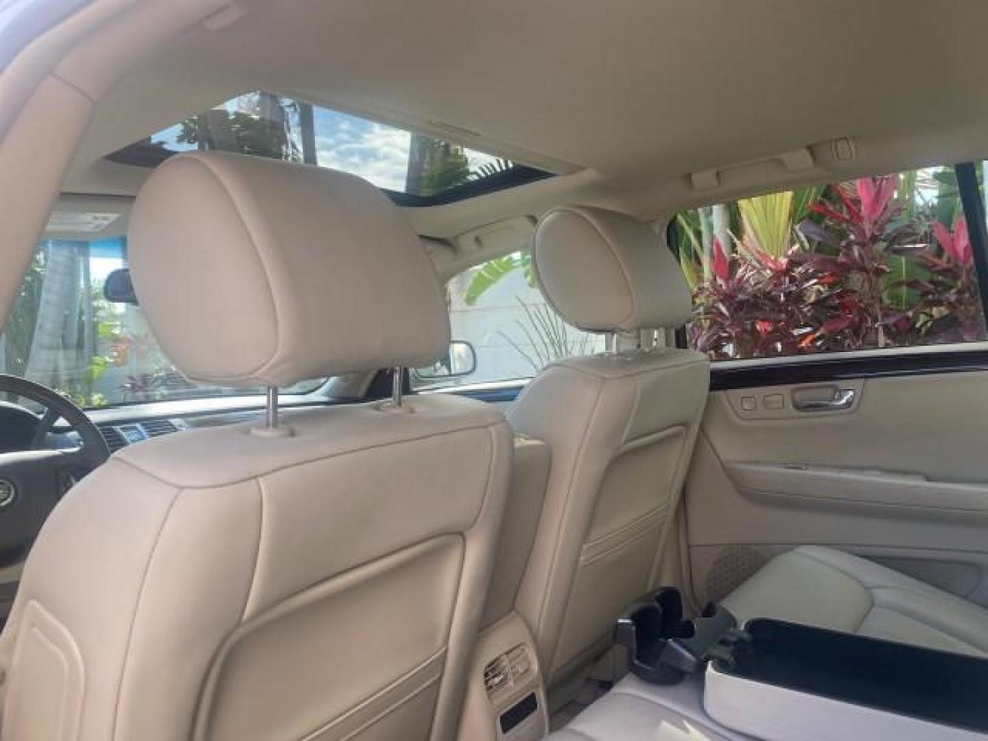 2010 Ocean Pearl Tricoat /Shale/Cocoa Cadillac DTS LOW MILES 39,495 NAV SUNROOF (1G6KH5EY7AU) with an Northstar 4.6L DOHC V8 Engine engine, Automatic transmission, located at 4701 North Dixie Hwy, Pompano Beach, FL, 33064, (954) 422-2889, 26.240938, -80.123474 - OUR WEBPAGE FLORIDACARS1.COM HAS OVER 100 PHOTOS AND FREE CARFAX LINK 2010 CADILLAC DTS PREMIUM COLLECTION $ 56,425 NEW VIN: 1G6KH5EY7AU102292 1 G 6 K H 5 E Y 7 A U 1 0 2 2 9 2 SEDAN 4 DR 4.6L V8 F DOHC 32V GASOLINE FRONT WHEEL DRIVE Top Features A/C Seat(s) Navigation System Alloy Wheels Parking Se - Photo#66