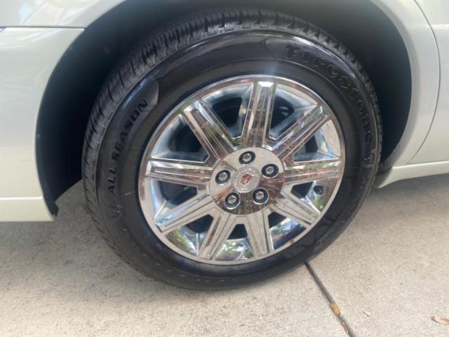 2010 Ocean Pearl Tricoat /Shale/Cocoa Cadillac DTS LOW MILES 39,495 NAV SUNROOF (1G6KH5EY7AU) with an Northstar 4.6L DOHC V8 Engine engine, Automatic transmission, located at 4701 North Dixie Hwy, Pompano Beach, FL, 33064, (954) 422-2889, 26.240938, -80.123474 - OUR WEBPAGE FLORIDACARS1.COM HAS OVER 100 PHOTOS AND FREE CARFAX LINK 2010 CADILLAC DTS PREMIUM COLLECTION $ 56,425 NEW VIN: 1G6KH5EY7AU102292 1 G 6 K H 5 E Y 7 A U 1 0 2 2 9 2 SEDAN 4 DR 4.6L V8 F DOHC 32V GASOLINE FRONT WHEEL DRIVE Top Features A/C Seat(s) Navigation System Alloy Wheels Parking Se - Photo#83