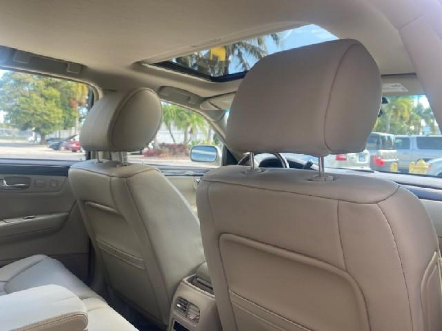 2010 Ocean Pearl Tricoat /Shale/Cocoa Cadillac DTS LOW MILES 39,495 NAV SUNROOF (1G6KH5EY7AU) with an Northstar 4.6L DOHC V8 Engine engine, Automatic transmission, located at 4701 North Dixie Hwy, Pompano Beach, FL, 33064, (954) 422-2889, 26.240938, -80.123474 - OUR WEBPAGE FLORIDACARS1.COM HAS OVER 100 PHOTOS AND FREE CARFAX LINK 2010 CADILLAC DTS PREMIUM COLLECTION $ 56,425 NEW VIN: 1G6KH5EY7AU102292 1 G 6 K H 5 E Y 7 A U 1 0 2 2 9 2 SEDAN 4 DR 4.6L V8 F DOHC 32V GASOLINE FRONT WHEEL DRIVE Top Features A/C Seat(s) Navigation System Alloy Wheels Parking Se - Photo#90