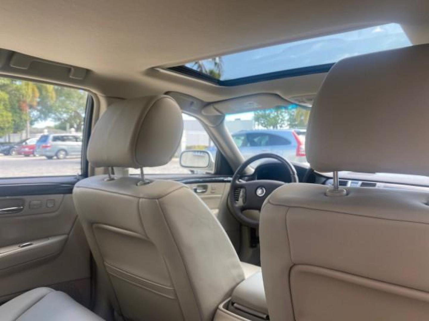 2010 Ocean Pearl Tricoat /Shale/Cocoa Cadillac DTS LOW MILES 39,495 NAV SUNROOF (1G6KH5EY7AU) with an Northstar 4.6L DOHC V8 Engine engine, Automatic transmission, located at 4701 North Dixie Hwy, Pompano Beach, FL, 33064, (954) 422-2889, 26.240938, -80.123474 - OUR WEBPAGE FLORIDACARS1.COM HAS OVER 100 PHOTOS AND FREE CARFAX LINK 2010 CADILLAC DTS PREMIUM COLLECTION $ 56,425 NEW VIN: 1G6KH5EY7AU102292 1 G 6 K H 5 E Y 7 A U 1 0 2 2 9 2 SEDAN 4 DR 4.6L V8 F DOHC 32V GASOLINE FRONT WHEEL DRIVE Top Features A/C Seat(s) Navigation System Alloy Wheels Parking Se - Photo#91