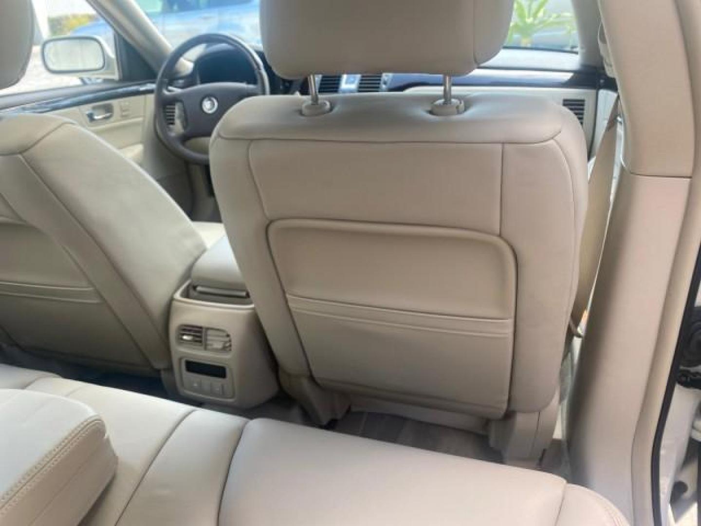 2010 Ocean Pearl Tricoat /Shale/Cocoa Cadillac DTS LOW MILES 39,495 NAV SUNROOF (1G6KH5EY7AU) with an Northstar 4.6L DOHC V8 Engine engine, Automatic transmission, located at 4701 North Dixie Hwy, Pompano Beach, FL, 33064, (954) 422-2889, 26.240938, -80.123474 - OUR WEBPAGE FLORIDACARS1.COM HAS OVER 100 PHOTOS AND FREE CARFAX LINK 2010 CADILLAC DTS PREMIUM COLLECTION $ 56,425 NEW VIN: 1G6KH5EY7AU102292 1 G 6 K H 5 E Y 7 A U 1 0 2 2 9 2 SEDAN 4 DR 4.6L V8 F DOHC 32V GASOLINE FRONT WHEEL DRIVE Top Features A/C Seat(s) Navigation System Alloy Wheels Parking Se - Photo#92