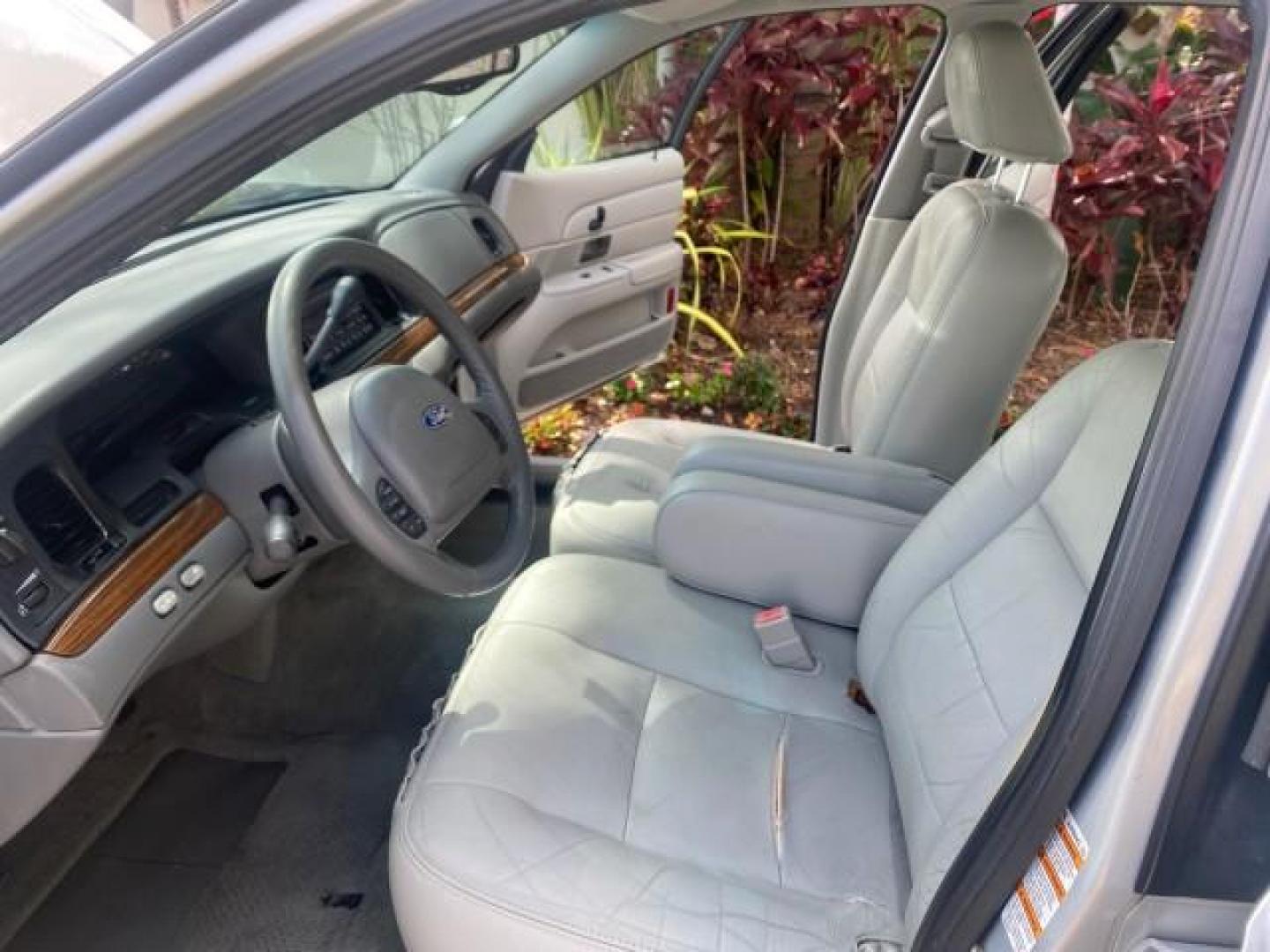 2003 Light Grey /Light Flint Ford Crown Victoria LX 1 OWNER SC LOW MILES 65,833 (2FAHP74W53X) with an 4.6L SEFI OHC V8 Engine engine, Automatic transmission, located at 4701 North Dixie Hwy, Pompano Beach, FL, 33064, (954) 422-2889, 26.240938, -80.123474 - OUR WEBPAGE FLORIDACARS1.COM HAS OVER 100 PHOTOS AND FREE CARFAX LINK 2003 FORD CROWN VICTORIA LX LEATHER VIN: 2FAHP74W53X149974 2 F A H P 7 4 W 5 3 X 1 4 9 9 7 4 SEDAN 4 DR DIGITAL DASH POWER SEATS BOTH SIDES 4.6L V8 F GASOLINE REAR WHEEL DRIVE Top Features Alloy Wheels Cloth Seats Basic Features A - Photo#10
