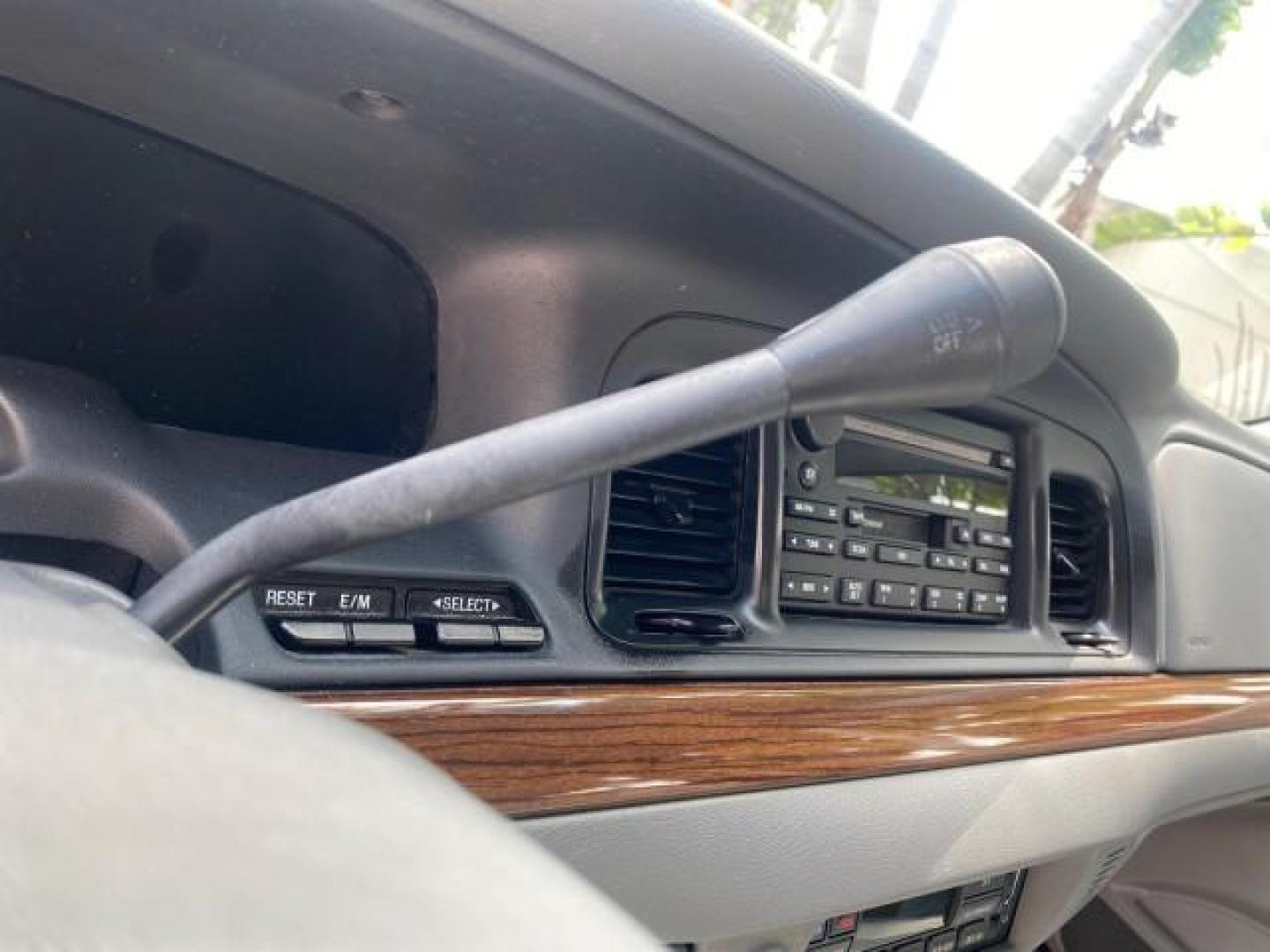 2003 Light Grey /Light Flint Ford Crown Victoria LX 1 OWNER SC LOW MILES 65,833 (2FAHP74W53X) with an 4.6L SEFI OHC V8 Engine engine, Automatic transmission, located at 4701 North Dixie Hwy, Pompano Beach, FL, 33064, (954) 422-2889, 26.240938, -80.123474 - OUR WEBPAGE FLORIDACARS1.COM HAS OVER 100 PHOTOS AND FREE CARFAX LINK 2003 FORD CROWN VICTORIA LX LEATHER VIN: 2FAHP74W53X149974 2 F A H P 7 4 W 5 3 X 1 4 9 9 7 4 SEDAN 4 DR DIGITAL DASH POWER SEATS BOTH SIDES 4.6L V8 F GASOLINE REAR WHEEL DRIVE Top Features Alloy Wheels Cloth Seats Basic Features A - Photo#39