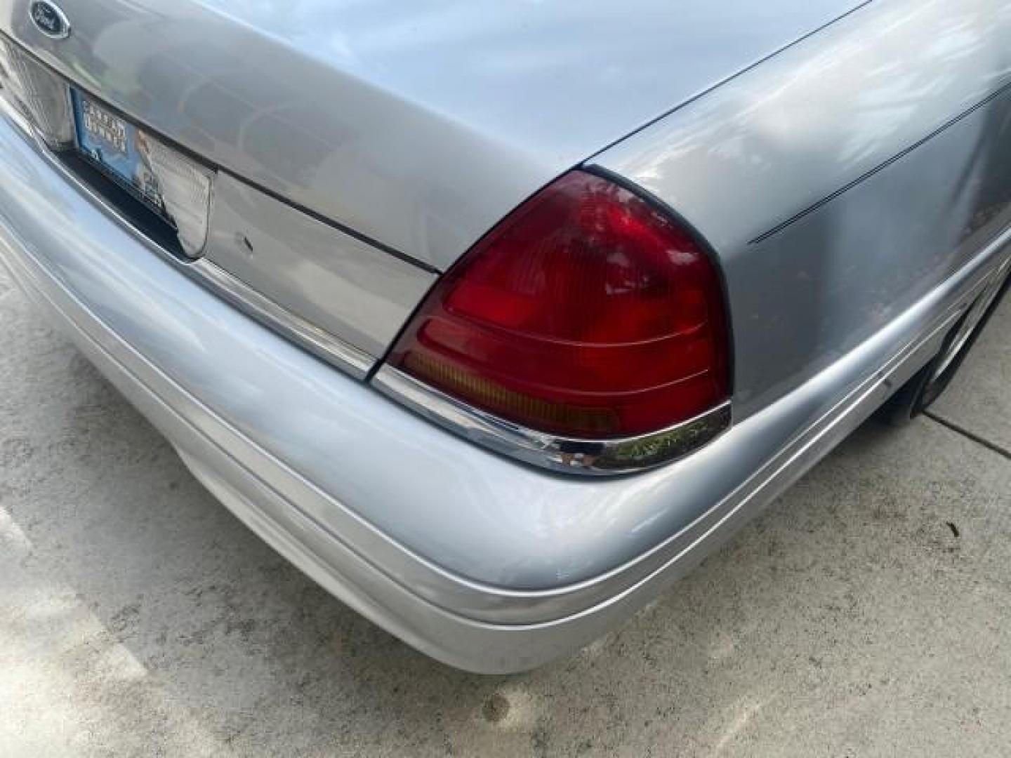 2003 Light Grey /Light Flint Ford Crown Victoria LX 1 OWNER SC LOW MILES 65,833 (2FAHP74W53X) with an 4.6L SEFI OHC V8 Engine engine, Automatic transmission, located at 4701 North Dixie Hwy, Pompano Beach, FL, 33064, (954) 422-2889, 26.240938, -80.123474 - OUR WEBPAGE FLORIDACARS1.COM HAS OVER 100 PHOTOS AND FREE CARFAX LINK 2003 FORD CROWN VICTORIA LX LEATHER VIN: 2FAHP74W53X149974 2 F A H P 7 4 W 5 3 X 1 4 9 9 7 4 SEDAN 4 DR DIGITAL DASH POWER SEATS BOTH SIDES 4.6L V8 F GASOLINE REAR WHEEL DRIVE Top Features Alloy Wheels Cloth Seats Basic Features A - Photo#71