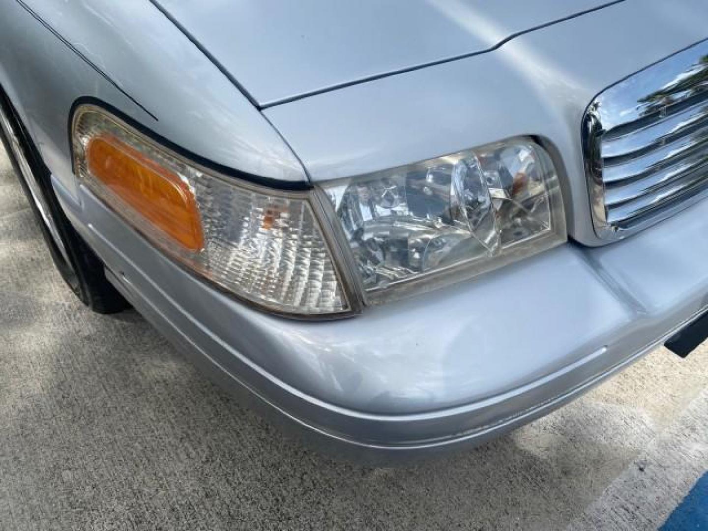 2003 Light Grey /Light Flint Ford Crown Victoria LX 1 OWNER SC LOW MILES 65,833 (2FAHP74W53X) with an 4.6L SEFI OHC V8 Engine engine, Automatic transmission, located at 4701 North Dixie Hwy, Pompano Beach, FL, 33064, (954) 422-2889, 26.240938, -80.123474 - OUR WEBPAGE FLORIDACARS1.COM HAS OVER 100 PHOTOS AND FREE CARFAX LINK 2003 FORD CROWN VICTORIA LX LEATHER VIN: 2FAHP74W53X149974 2 F A H P 7 4 W 5 3 X 1 4 9 9 7 4 SEDAN 4 DR DIGITAL DASH POWER SEATS BOTH SIDES 4.6L V8 F GASOLINE REAR WHEEL DRIVE Top Features Alloy Wheels Cloth Seats Basic Features A - Photo#97