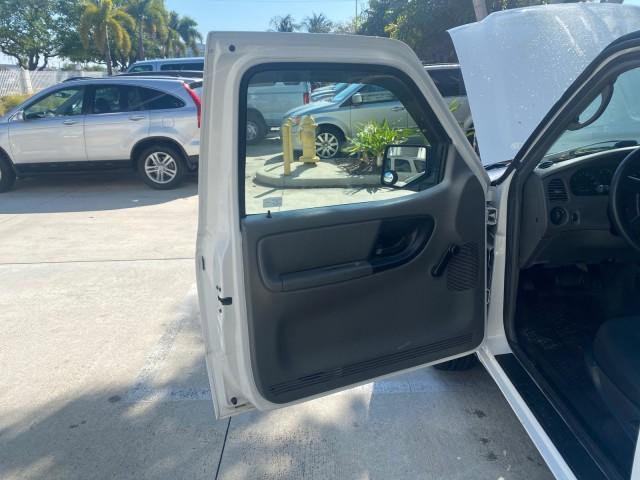 2010 Oxford White /Medium Dark Flint Ford Ranger XL 1 OWNER AC LOW MILES 84,277 (1FTKR1ED3AP) with an 2.3L DOHC 16-Valve I4 Engine engine, Automatic transmission, located at 4701 North Dixie Hwy, Pompano Beach, FL, 33064, (954) 422-2889, 26.240938, -80.123474 - OUR WEBPAGE FLORIDACARS1.COM HAS OVER 100 PHOTOS AND FREE CARFAX LINK 2010 FORD RANGER XL VIN: 1FTKR1ED3APA10031 1 F T K R 1 E D 3 A P A 1 0 0 3 1 CLUB CAB PICKUP 2.3L I4 F DOHC 16V GASOLINE REAR WHEEL DRIVE Top Features Bed Liner Tow Hitch Cloth Seats Basic Features ABS Brakes Air Conditioning Side - Photo#9