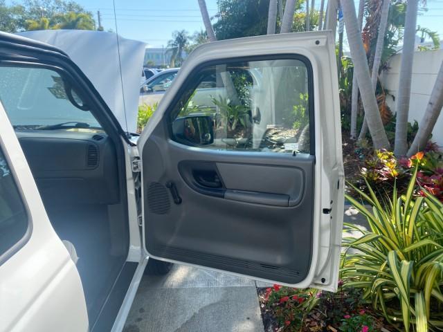 2010 Oxford White /Medium Dark Flint Ford Ranger XL 1 OWNER AC LOW MILES 84,277 (1FTKR1ED3AP) with an 2.3L DOHC 16-Valve I4 Engine engine, Automatic transmission, located at 4701 North Dixie Hwy, Pompano Beach, FL, 33064, (954) 422-2889, 26.240938, -80.123474 - OUR WEBPAGE FLORIDACARS1.COM HAS OVER 100 PHOTOS AND FREE CARFAX LINK 2010 FORD RANGER XL VIN: 1FTKR1ED3APA10031 1 F T K R 1 E D 3 A P A 1 0 0 3 1 CLUB CAB PICKUP 2.3L I4 F DOHC 16V GASOLINE REAR WHEEL DRIVE Top Features Bed Liner Tow Hitch Cloth Seats Basic Features ABS Brakes Air Conditioning Side - Photo#11