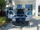 2010 Oxford White /Medium Dark Flint Ford Ranger XL AUTO AC LOW MILES 84,272 (1FTKR1ED3AP) with an 2.3L DOHC 16-Valve I4 Engine engine, Automatic transmission, located at 4701 North Dixie Hwy, Pompano Beach, FL, 33064, (954) 422-2889, 26.240938, -80.123474 - OUR WEBPAGE FLORIDACARS1.COM HAS OVER 100 PHOTOS AND FREE CARFAX LINK 2010 FORD RANGER XL VIN: 1FTKR1ED3APA10031 1 F T K R 1 E D 3 A P A 1 0 0 3 1 CLUB CAB PICKUP 2.3L I4 F DOHC 16V GASOLINE REAR WHEEL DRIVE Top Features Bed Liner Tow Hitch Cloth Seats Basic Features ABS Brakes Air Conditioning Side - Photo#14