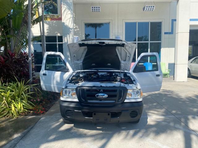 2010 Oxford White /Medium Dark Flint Ford Ranger XL 1 OWNER AC LOW MILES 84,277 (1FTKR1ED3AP) with an 2.3L DOHC 16-Valve I4 Engine engine, Automatic transmission, located at 4701 North Dixie Hwy, Pompano Beach, FL, 33064, (954) 422-2889, 26.240938, -80.123474 - OUR WEBPAGE FLORIDACARS1.COM HAS OVER 100 PHOTOS AND FREE CARFAX LINK 2010 FORD RANGER XL VIN: 1FTKR1ED3APA10031 1 F T K R 1 E D 3 A P A 1 0 0 3 1 CLUB CAB PICKUP 2.3L I4 F DOHC 16V GASOLINE REAR WHEEL DRIVE Top Features Bed Liner Tow Hitch Cloth Seats Basic Features ABS Brakes Air Conditioning Side - Photo#14