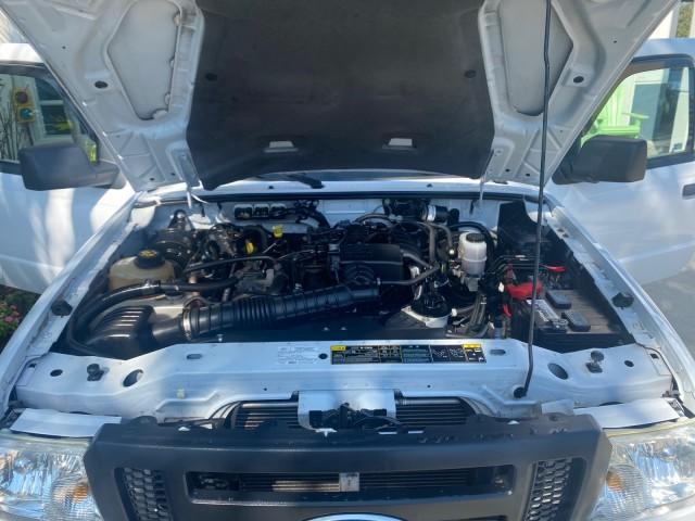 2010 Oxford White /Medium Dark Flint Ford Ranger XL 1 OWNER AC LOW MILES 84,277 (1FTKR1ED3AP) with an 2.3L DOHC 16-Valve I4 Engine engine, Automatic transmission, located at 4701 North Dixie Hwy, Pompano Beach, FL, 33064, (954) 422-2889, 26.240938, -80.123474 - OUR WEBPAGE FLORIDACARS1.COM HAS OVER 100 PHOTOS AND FREE CARFAX LINK 2010 FORD RANGER XL VIN: 1FTKR1ED3APA10031 1 F T K R 1 E D 3 A P A 1 0 0 3 1 CLUB CAB PICKUP 2.3L I4 F DOHC 16V GASOLINE REAR WHEEL DRIVE Top Features Bed Liner Tow Hitch Cloth Seats Basic Features ABS Brakes Air Conditioning Side - Photo#15