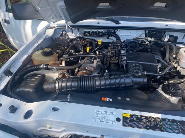 2010 Oxford White /Medium Dark Flint Ford Ranger XL 1 OWNER AC LOW MILES 84,277 (1FTKR1ED3AP) with an 2.3L DOHC 16-Valve I4 Engine engine, Automatic transmission, located at 4701 North Dixie Hwy, Pompano Beach, FL, 33064, (954) 422-2889, 26.240938, -80.123474 - OUR WEBPAGE FLORIDACARS1.COM HAS OVER 100 PHOTOS AND FREE CARFAX LINK 2010 FORD RANGER XL VIN: 1FTKR1ED3APA10031 1 F T K R 1 E D 3 A P A 1 0 0 3 1 CLUB CAB PICKUP 2.3L I4 F DOHC 16V GASOLINE REAR WHEEL DRIVE Top Features Bed Liner Tow Hitch Cloth Seats Basic Features ABS Brakes Air Conditioning Side - Photo#16