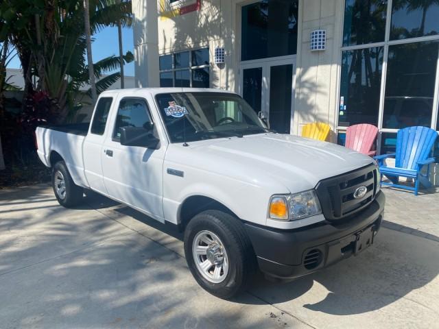 2010 Oxford White /Medium Dark Flint Ford Ranger XL 1 OWNER AC LOW MILES 84,277 (1FTKR1ED3AP) with an 2.3L DOHC 16-Valve I4 Engine engine, Automatic transmission, located at 4701 North Dixie Hwy, Pompano Beach, FL, 33064, (954) 422-2889, 26.240938, -80.123474 - OUR WEBPAGE FLORIDACARS1.COM HAS OVER 100 PHOTOS AND FREE CARFAX LINK 2010 FORD RANGER XL VIN: 1FTKR1ED3APA10031 1 F T K R 1 E D 3 A P A 1 0 0 3 1 CLUB CAB PICKUP 2.3L I4 F DOHC 16V GASOLINE REAR WHEEL DRIVE Top Features Bed Liner Tow Hitch Cloth Seats Basic Features ABS Brakes Air Conditioning Side - Photo#1