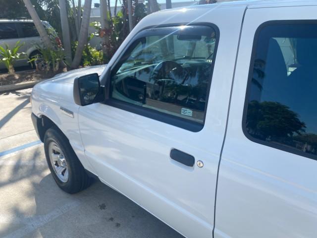 2010 Oxford White /Medium Dark Flint Ford Ranger XL 1 OWNER AC LOW MILES 84,277 (1FTKR1ED3AP) with an 2.3L DOHC 16-Valve I4 Engine engine, Automatic transmission, located at 4701 North Dixie Hwy, Pompano Beach, FL, 33064, (954) 422-2889, 26.240938, -80.123474 - OUR WEBPAGE FLORIDACARS1.COM HAS OVER 100 PHOTOS AND FREE CARFAX LINK 2010 FORD RANGER XL VIN: 1FTKR1ED3APA10031 1 F T K R 1 E D 3 A P A 1 0 0 3 1 CLUB CAB PICKUP 2.3L I4 F DOHC 16V GASOLINE REAR WHEEL DRIVE Top Features Bed Liner Tow Hitch Cloth Seats Basic Features ABS Brakes Air Conditioning Side - Photo#25