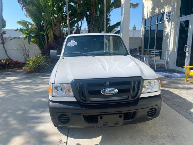 2010 Oxford White /Medium Dark Flint Ford Ranger XL 1 OWNER AC LOW MILES 84,277 (1FTKR1ED3AP) with an 2.3L DOHC 16-Valve I4 Engine engine, Automatic transmission, located at 4701 North Dixie Hwy, Pompano Beach, FL, 33064, (954) 422-2889, 26.240938, -80.123474 - OUR WEBPAGE FLORIDACARS1.COM HAS OVER 100 PHOTOS AND FREE CARFAX LINK 2010 FORD RANGER XL VIN: 1FTKR1ED3APA10031 1 F T K R 1 E D 3 A P A 1 0 0 3 1 CLUB CAB PICKUP 2.3L I4 F DOHC 16V GASOLINE REAR WHEEL DRIVE Top Features Bed Liner Tow Hitch Cloth Seats Basic Features ABS Brakes Air Conditioning Side - Photo#2