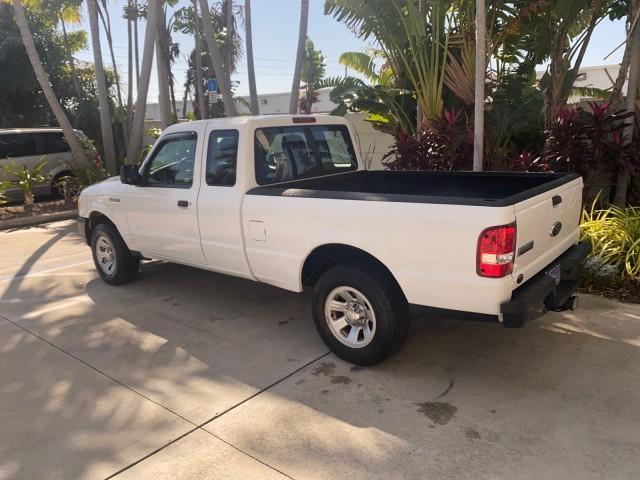 2010 Oxford White /Medium Dark Flint Ford Ranger XL 1 OWNER AC LOW MILES 84,277 (1FTKR1ED3AP) with an 2.3L DOHC 16-Valve I4 Engine engine, Automatic transmission, located at 4701 North Dixie Hwy, Pompano Beach, FL, 33064, (954) 422-2889, 26.240938, -80.123474 - OUR WEBPAGE FLORIDACARS1.COM HAS OVER 100 PHOTOS AND FREE CARFAX LINK 2010 FORD RANGER XL VIN: 1FTKR1ED3APA10031 1 F T K R 1 E D 3 A P A 1 0 0 3 1 CLUB CAB PICKUP 2.3L I4 F DOHC 16V GASOLINE REAR WHEEL DRIVE Top Features Bed Liner Tow Hitch Cloth Seats Basic Features ABS Brakes Air Conditioning Side - Photo#5