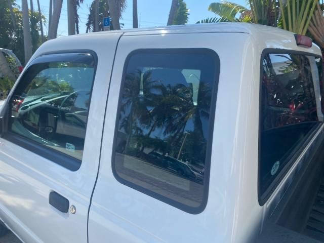 2010 Oxford White /Medium Dark Flint Ford Ranger XL 1 OWNER AC LOW MILES 84,277 (1FTKR1ED3AP) with an 2.3L DOHC 16-Valve I4 Engine engine, Automatic transmission, located at 4701 North Dixie Hwy, Pompano Beach, FL, 33064, (954) 422-2889, 26.240938, -80.123474 - OUR WEBPAGE FLORIDACARS1.COM HAS OVER 100 PHOTOS AND FREE CARFAX LINK 2010 FORD RANGER XL VIN: 1FTKR1ED3APA10031 1 F T K R 1 E D 3 A P A 1 0 0 3 1 CLUB CAB PICKUP 2.3L I4 F DOHC 16V GASOLINE REAR WHEEL DRIVE Top Features Bed Liner Tow Hitch Cloth Seats Basic Features ABS Brakes Air Conditioning Side - Photo#59