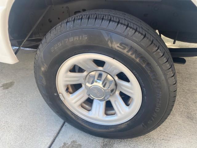 2010 Oxford White /Medium Dark Flint Ford Ranger XL 1 OWNER AC LOW MILES 84,277 (1FTKR1ED3AP) with an 2.3L DOHC 16-Valve I4 Engine engine, Automatic transmission, located at 4701 North Dixie Hwy, Pompano Beach, FL, 33064, (954) 422-2889, 26.240938, -80.123474 - OUR WEBPAGE FLORIDACARS1.COM HAS OVER 100 PHOTOS AND FREE CARFAX LINK 2010 FORD RANGER XL VIN: 1FTKR1ED3APA10031 1 F T K R 1 E D 3 A P A 1 0 0 3 1 CLUB CAB PICKUP 2.3L I4 F DOHC 16V GASOLINE REAR WHEEL DRIVE Top Features Bed Liner Tow Hitch Cloth Seats Basic Features ABS Brakes Air Conditioning Side - Photo#65