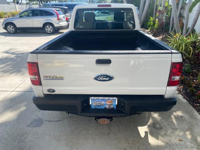 2010 Oxford White /Medium Dark Flint Ford Ranger XL 1 OWNER AC LOW MILES 84,277 (1FTKR1ED3AP) with an 2.3L DOHC 16-Valve I4 Engine engine, Automatic transmission, located at 4701 North Dixie Hwy, Pompano Beach, FL, 33064, (954) 422-2889, 26.240938, -80.123474 - OUR WEBPAGE FLORIDACARS1.COM HAS OVER 100 PHOTOS AND FREE CARFAX LINK 2010 FORD RANGER XL VIN: 1FTKR1ED3APA10031 1 F T K R 1 E D 3 A P A 1 0 0 3 1 CLUB CAB PICKUP 2.3L I4 F DOHC 16V GASOLINE REAR WHEEL DRIVE Top Features Bed Liner Tow Hitch Cloth Seats Basic Features ABS Brakes Air Conditioning Side - Photo#69
