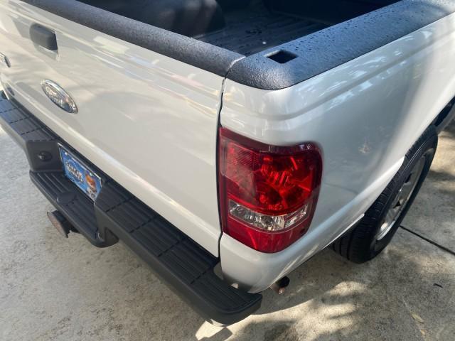 2010 Oxford White /Medium Dark Flint Ford Ranger XL 1 OWNER AC LOW MILES 84,277 (1FTKR1ED3AP) with an 2.3L DOHC 16-Valve I4 Engine engine, Automatic transmission, located at 4701 North Dixie Hwy, Pompano Beach, FL, 33064, (954) 422-2889, 26.240938, -80.123474 - OUR WEBPAGE FLORIDACARS1.COM HAS OVER 100 PHOTOS AND FREE CARFAX LINK 2010 FORD RANGER XL VIN: 1FTKR1ED3APA10031 1 F T K R 1 E D 3 A P A 1 0 0 3 1 CLUB CAB PICKUP 2.3L I4 F DOHC 16V GASOLINE REAR WHEEL DRIVE Top Features Bed Liner Tow Hitch Cloth Seats Basic Features ABS Brakes Air Conditioning Side - Photo#72