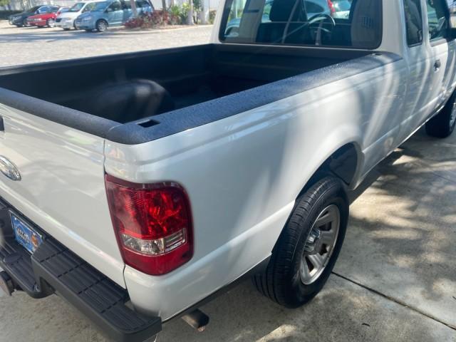 2010 Oxford White /Medium Dark Flint Ford Ranger XL 1 OWNER AC LOW MILES 84,277 (1FTKR1ED3AP) with an 2.3L DOHC 16-Valve I4 Engine engine, Automatic transmission, located at 4701 North Dixie Hwy, Pompano Beach, FL, 33064, (954) 422-2889, 26.240938, -80.123474 - OUR WEBPAGE FLORIDACARS1.COM HAS OVER 100 PHOTOS AND FREE CARFAX LINK 2010 FORD RANGER XL VIN: 1FTKR1ED3APA10031 1 F T K R 1 E D 3 A P A 1 0 0 3 1 CLUB CAB PICKUP 2.3L I4 F DOHC 16V GASOLINE REAR WHEEL DRIVE Top Features Bed Liner Tow Hitch Cloth Seats Basic Features ABS Brakes Air Conditioning Side - Photo#73
