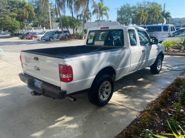 2010 Oxford White /Medium Dark Flint Ford Ranger XL 1 OWNER AC LOW MILES 84,277 (1FTKR1ED3AP) with an 2.3L DOHC 16-Valve I4 Engine engine, Automatic transmission, located at 4701 North Dixie Hwy, Pompano Beach, FL, 33064, (954) 422-2889, 26.240938, -80.123474 - OUR WEBPAGE FLORIDACARS1.COM HAS OVER 100 PHOTOS AND FREE CARFAX LINK 2010 FORD RANGER XL VIN: 1FTKR1ED3APA10031 1 F T K R 1 E D 3 A P A 1 0 0 3 1 CLUB CAB PICKUP 2.3L I4 F DOHC 16V GASOLINE REAR WHEEL DRIVE Top Features Bed Liner Tow Hitch Cloth Seats Basic Features ABS Brakes Air Conditioning Side - Photo#7