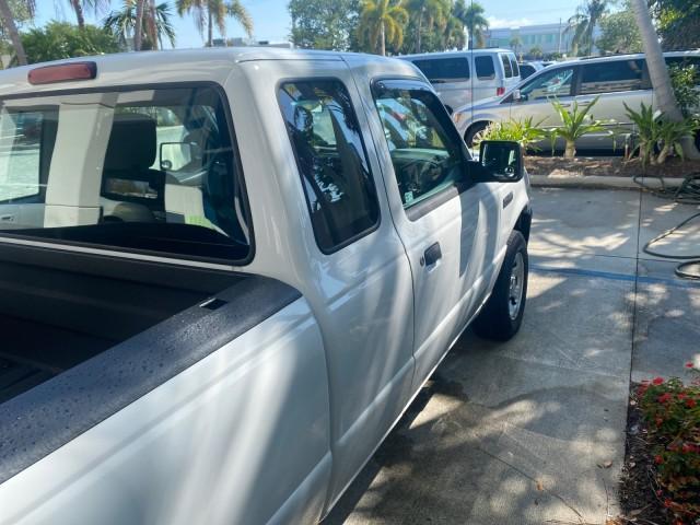 2010 Oxford White /Medium Dark Flint Ford Ranger XL 1 OWNER AC LOW MILES 84,277 (1FTKR1ED3AP) with an 2.3L DOHC 16-Valve I4 Engine engine, Automatic transmission, located at 4701 North Dixie Hwy, Pompano Beach, FL, 33064, (954) 422-2889, 26.240938, -80.123474 - OUR WEBPAGE FLORIDACARS1.COM HAS OVER 100 PHOTOS AND FREE CARFAX LINK 2010 FORD RANGER XL VIN: 1FTKR1ED3APA10031 1 F T K R 1 E D 3 A P A 1 0 0 3 1 CLUB CAB PICKUP 2.3L I4 F DOHC 16V GASOLINE REAR WHEEL DRIVE Top Features Bed Liner Tow Hitch Cloth Seats Basic Features ABS Brakes Air Conditioning Side - Photo#83