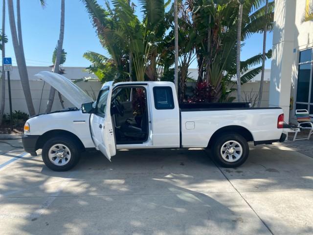2010 Oxford White /Medium Dark Flint Ford Ranger XL 1 OWNER AC LOW MILES 84,277 (1FTKR1ED3AP) with an 2.3L DOHC 16-Valve I4 Engine engine, Automatic transmission, located at 4701 North Dixie Hwy, Pompano Beach, FL, 33064, (954) 422-2889, 26.240938, -80.123474 - OUR WEBPAGE FLORIDACARS1.COM HAS OVER 100 PHOTOS AND FREE CARFAX LINK 2010 FORD RANGER XL VIN: 1FTKR1ED3APA10031 1 F T K R 1 E D 3 A P A 1 0 0 3 1 CLUB CAB PICKUP 2.3L I4 F DOHC 16V GASOLINE REAR WHEEL DRIVE Top Features Bed Liner Tow Hitch Cloth Seats Basic Features ABS Brakes Air Conditioning Side - Photo#8