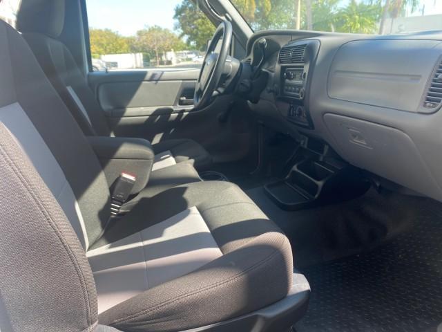 2010 Oxford White /Medium Dark Flint Ford Ranger XL 1 OWNER AC LOW MILES 84,277 (1FTKR1ED3AP) with an 2.3L DOHC 16-Valve I4 Engine engine, Automatic transmission, located at 4701 North Dixie Hwy, Pompano Beach, FL, 33064, (954) 422-2889, 26.240938, -80.123474 - OUR WEBPAGE FLORIDACARS1.COM HAS OVER 100 PHOTOS AND FREE CARFAX LINK 2010 FORD RANGER XL VIN: 1FTKR1ED3APA10031 1 F T K R 1 E D 3 A P A 1 0 0 3 1 CLUB CAB PICKUP 2.3L I4 F DOHC 16V GASOLINE REAR WHEEL DRIVE Top Features Bed Liner Tow Hitch Cloth Seats Basic Features ABS Brakes Air Conditioning Side - Photo#93