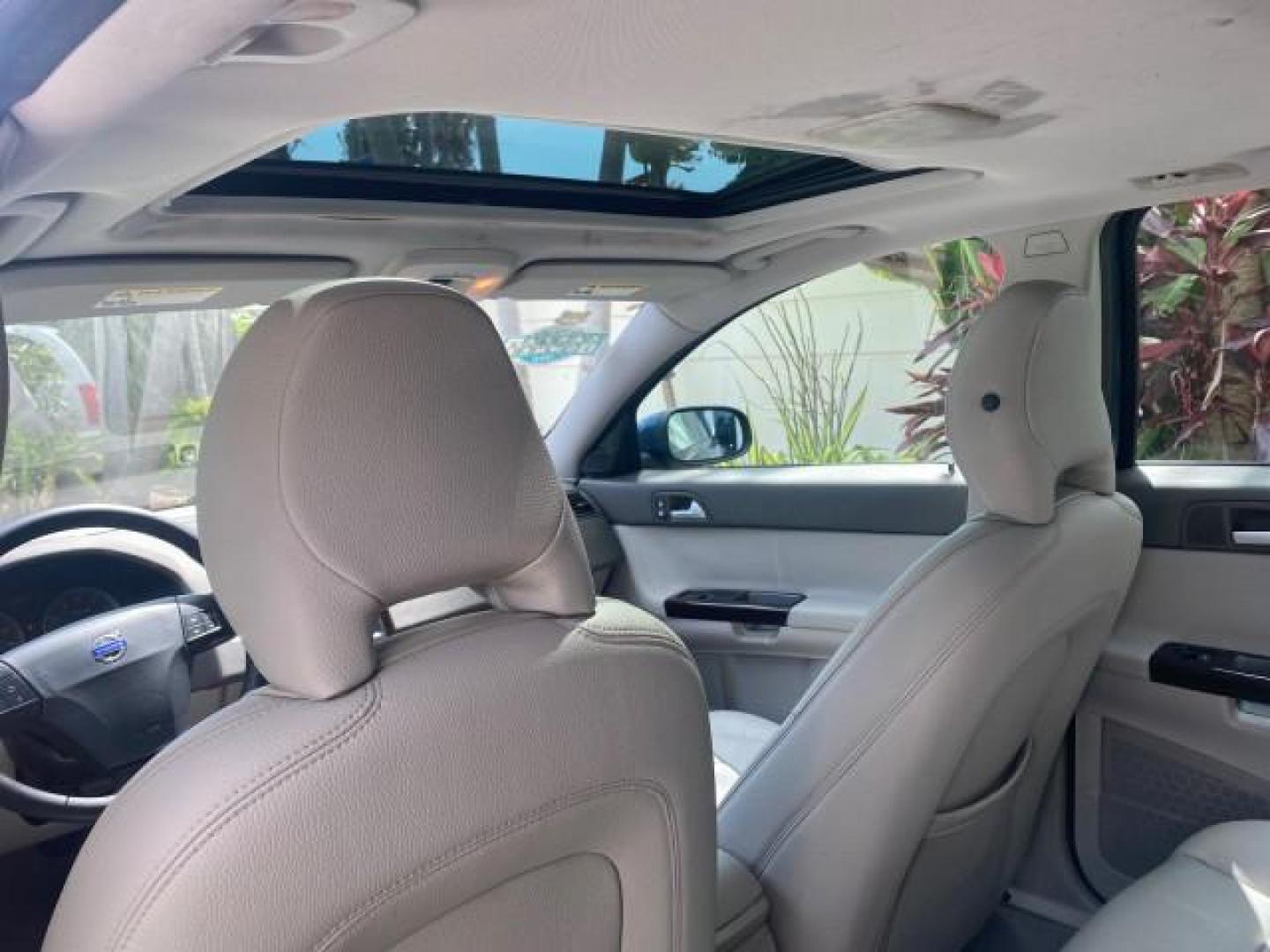 2007 Barents Blue Metallic /Quartz Beige Volvo V50 LOW MILES 30,345 SUNROOF 2.4LSW (YV1MW382372) with an 2.4L DOHC 20-Valve I5 Engine engine, Automatic transmission, located at 4701 North Dixie Hwy, Pompano Beach, FL, 33064, (954) 422-2889, 26.240938, -80.123474 - OUR WEBPAGE FLORIDACARS1.COM HAS OVER 100 PHOTOS AND FREE CARFAX LINK 2007 VOLVO V50 2.4I VIN: YV1MW382372278472 Y V 1 M W 3 8 2 3 7 2 2 7 8 4 7 2 WAGON 4 DR 2.4L I5 F DOHC 20V 31 MPG GASOLINE FRONT WHEEL DRIVE Top Features Alloy Wheels Leather Seats Sunroof(s) Basic Features ABS Brakes CD Audio Pow - Photo#60
