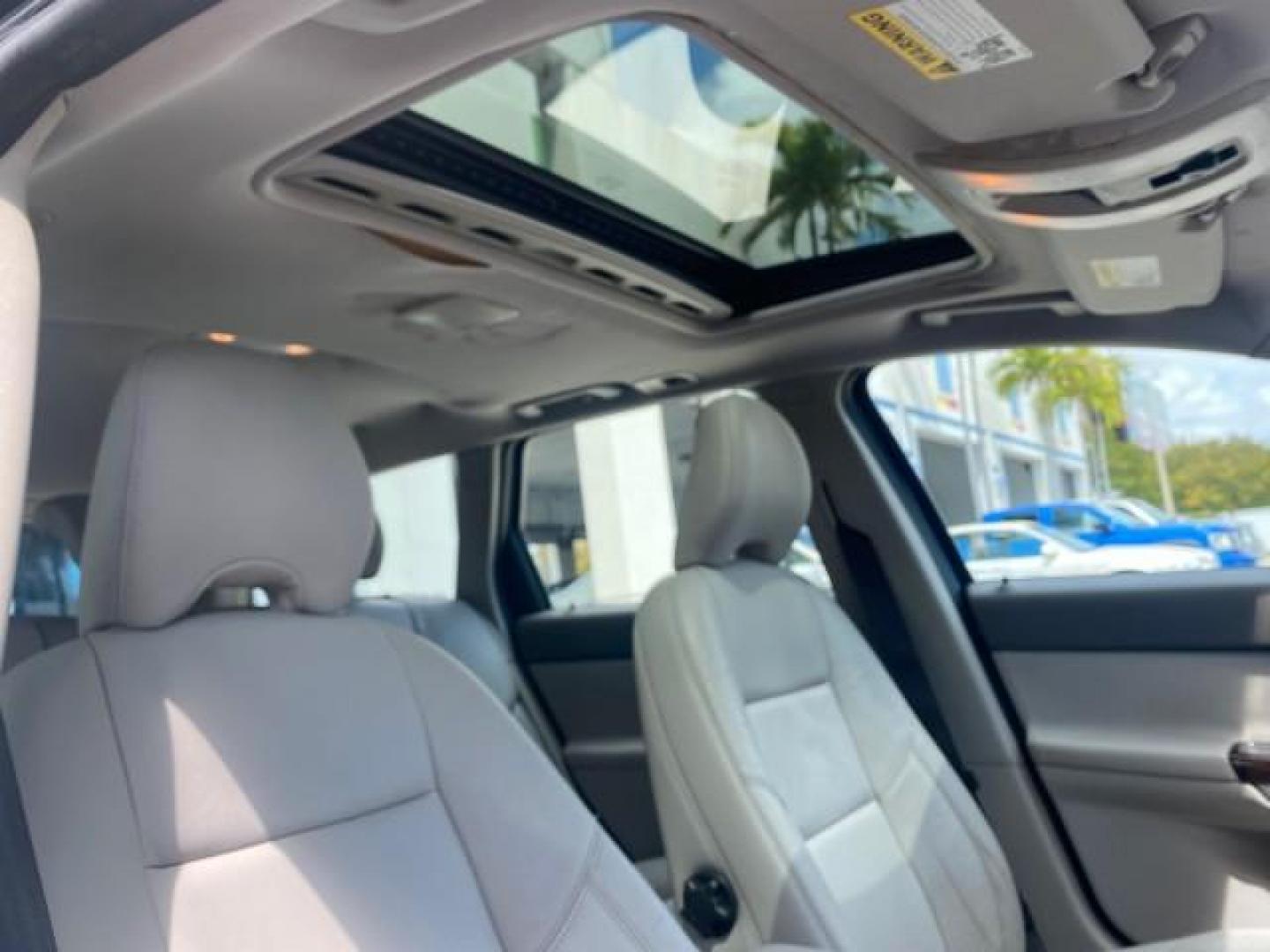 2007 Barents Blue Metallic /Quartz Beige Volvo V50 LOW MILES 30,345 SUNROOF 2.4LSW (YV1MW382372) with an 2.4L DOHC 20-Valve I5 Engine engine, Automatic transmission, located at 4701 North Dixie Hwy, Pompano Beach, FL, 33064, (954) 422-2889, 26.240938, -80.123474 - OUR WEBPAGE FLORIDACARS1.COM HAS OVER 100 PHOTOS AND FREE CARFAX LINK 2007 VOLVO V50 2.4I VIN: YV1MW382372278472 Y V 1 M W 3 8 2 3 7 2 2 7 8 4 7 2 WAGON 4 DR 2.4L I5 F DOHC 20V 31 MPG GASOLINE FRONT WHEEL DRIVE Top Features Alloy Wheels Leather Seats Sunroof(s) Basic Features ABS Brakes CD Audio Pow - Photo#91