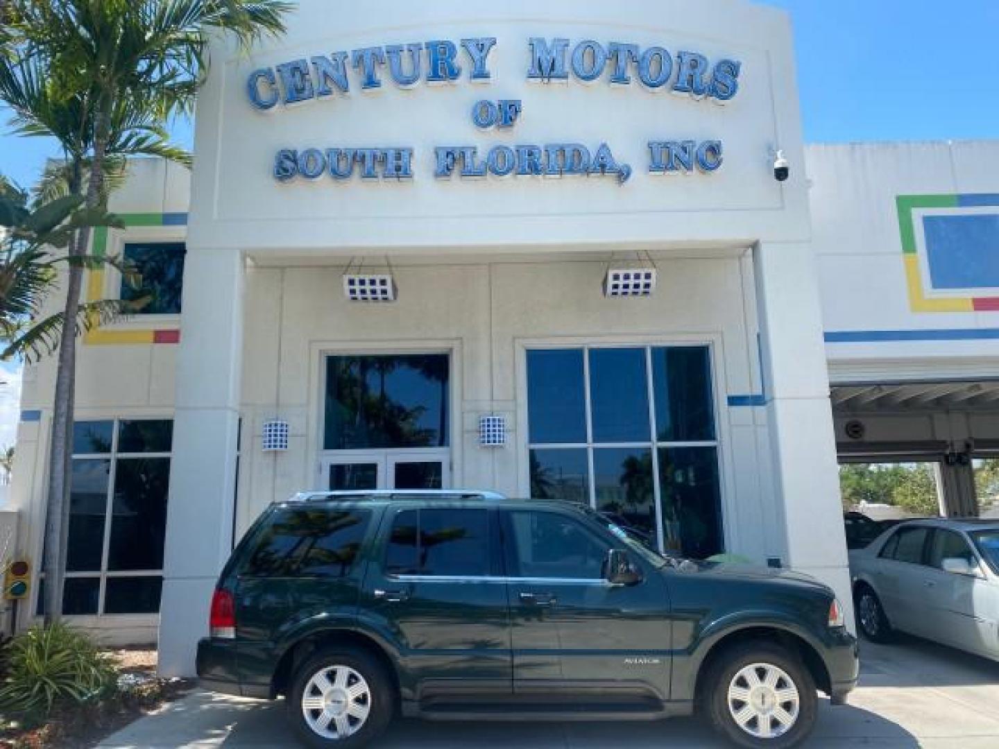 2003 Aspen Green Metallic /Light Parchment Lincoln Aviator Premium SUNROOF LEATHER NAV (5LMEU68H43Z) with an 4.6L DOHC 32-Valve V8 Engine engine, Automatic transmission, located at 4701 North Dixie Hwy, Pompano Beach, FL, 33064, (954) 422-2889, 26.240938, -80.123474 - OUR WEBPAGE FLORIDACARS1.COM HAS OVER 100 PHOTOS AND FREE CARFAX LINK 2003 LINCOLN AVIATOR PREMIUM NAV VIN: 5LMEU68H43ZJ52878 5 L M E U 6 8 H 4 3 Z J 5 2 8 7 8 4 DOOR WAGON/SPORT UTILITY 4.6L V8 F DOHC GASOLINE REAR WHEEL DRIVE Top Features Alloy Wheels Rear View Camera Fold-Away Third Row Running B - Photo#0