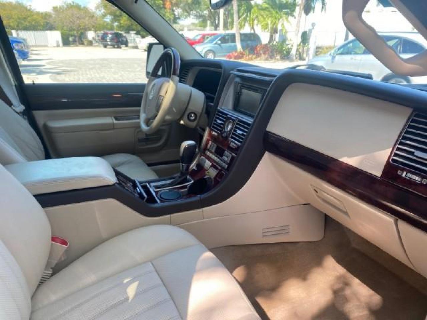 2003 Aspen Green Metallic /Light Parchment Lincoln Aviator Premium SUNROOF LEATHER NAV (5LMEU68H43Z) with an 4.6L DOHC 32-Valve V8 Engine engine, Automatic transmission, located at 4701 North Dixie Hwy, Pompano Beach, FL, 33064, (954) 422-2889, 26.240938, -80.123474 - OUR WEBPAGE FLORIDACARS1.COM HAS OVER 100 PHOTOS AND FREE CARFAX LINK 2003 LINCOLN AVIATOR PREMIUM NAV VIN: 5LMEU68H43ZJ52878 5 L M E U 6 8 H 4 3 Z J 5 2 8 7 8 4 DOOR WAGON/SPORT UTILITY 4.6L V8 F DOHC GASOLINE REAR WHEEL DRIVE Top Features Alloy Wheels Rear View Camera Fold-Away Third Row Running B - Photo#99
