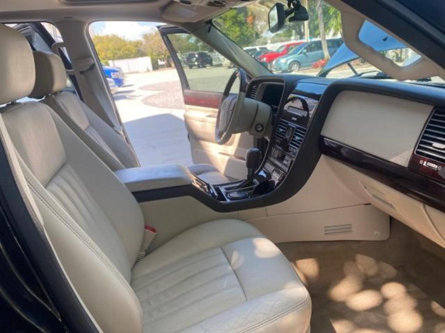 2003 Aspen Green Metallic /Light Parchment Lincoln Aviator Premium SUNROOF LEATHER NAV (5LMEU68H43Z) with an 4.6L DOHC 32-Valve V8 Engine engine, Automatic transmission, located at 4701 North Dixie Hwy, Pompano Beach, FL, 33064, (954) 422-2889, 26.240938, -80.123474 - OUR WEBPAGE FLORIDACARS1.COM HAS OVER 100 PHOTOS AND FREE CARFAX LINK 2003 LINCOLN AVIATOR PREMIUM NAV VIN: 5LMEU68H43ZJ52878 5 L M E U 6 8 H 4 3 Z J 5 2 8 7 8 4 DOOR WAGON/SPORT UTILITY 4.6L V8 F DOHC GASOLINE REAR WHEEL DRIVE Top Features Alloy Wheels Rear View Camera Fold-Away Third Row Running B - Photo#12