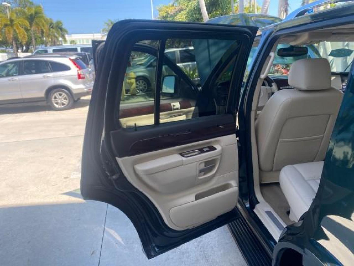2003 Aspen Green Metallic /Light Parchment Lincoln Aviator Premium SUNROOF LEATHER NAV (5LMEU68H43Z) with an 4.6L DOHC 32-Valve V8 Engine engine, Automatic transmission, located at 4701 North Dixie Hwy, Pompano Beach, FL, 33064, (954) 422-2889, 26.240938, -80.123474 - OUR WEBPAGE FLORIDACARS1.COM HAS OVER 100 PHOTOS AND FREE CARFAX LINK 2003 LINCOLN AVIATOR PREMIUM NAV VIN: 5LMEU68H43ZJ52878 5 L M E U 6 8 H 4 3 Z J 5 2 8 7 8 4 DOOR WAGON/SPORT UTILITY 4.6L V8 F DOHC GASOLINE REAR WHEEL DRIVE Top Features Alloy Wheels Rear View Camera Fold-Away Third Row Running B - Photo#13